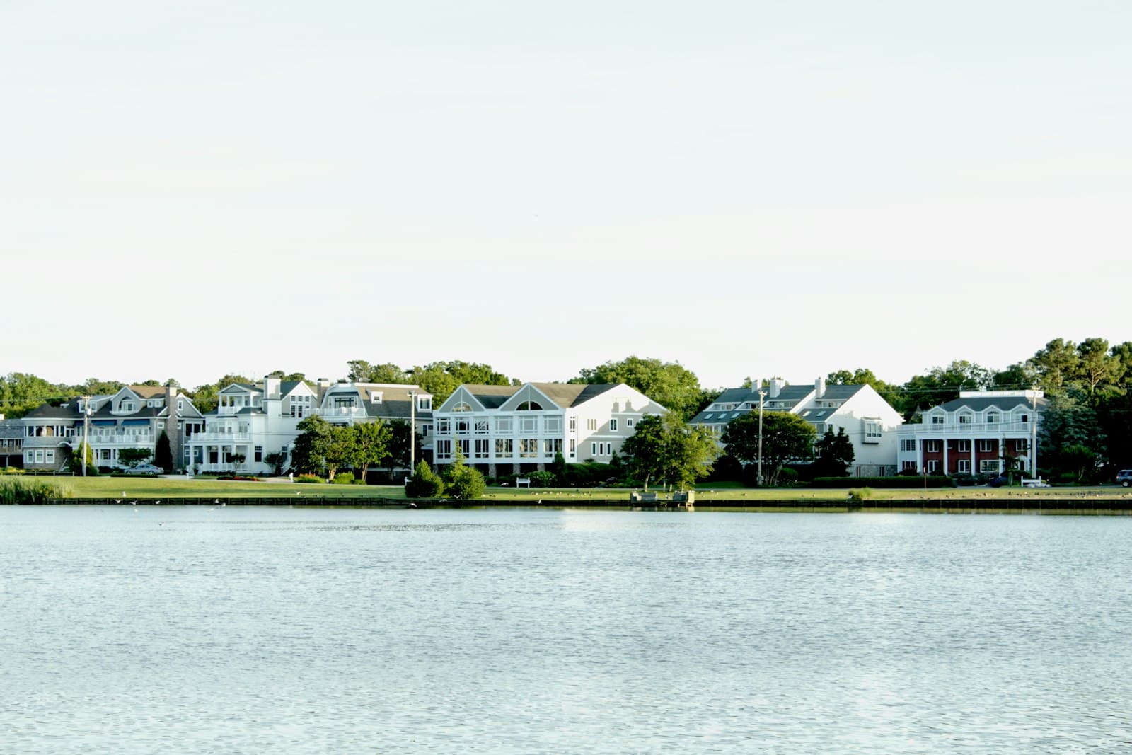 Rehoboth Beach — white and green house near body of water during daytime