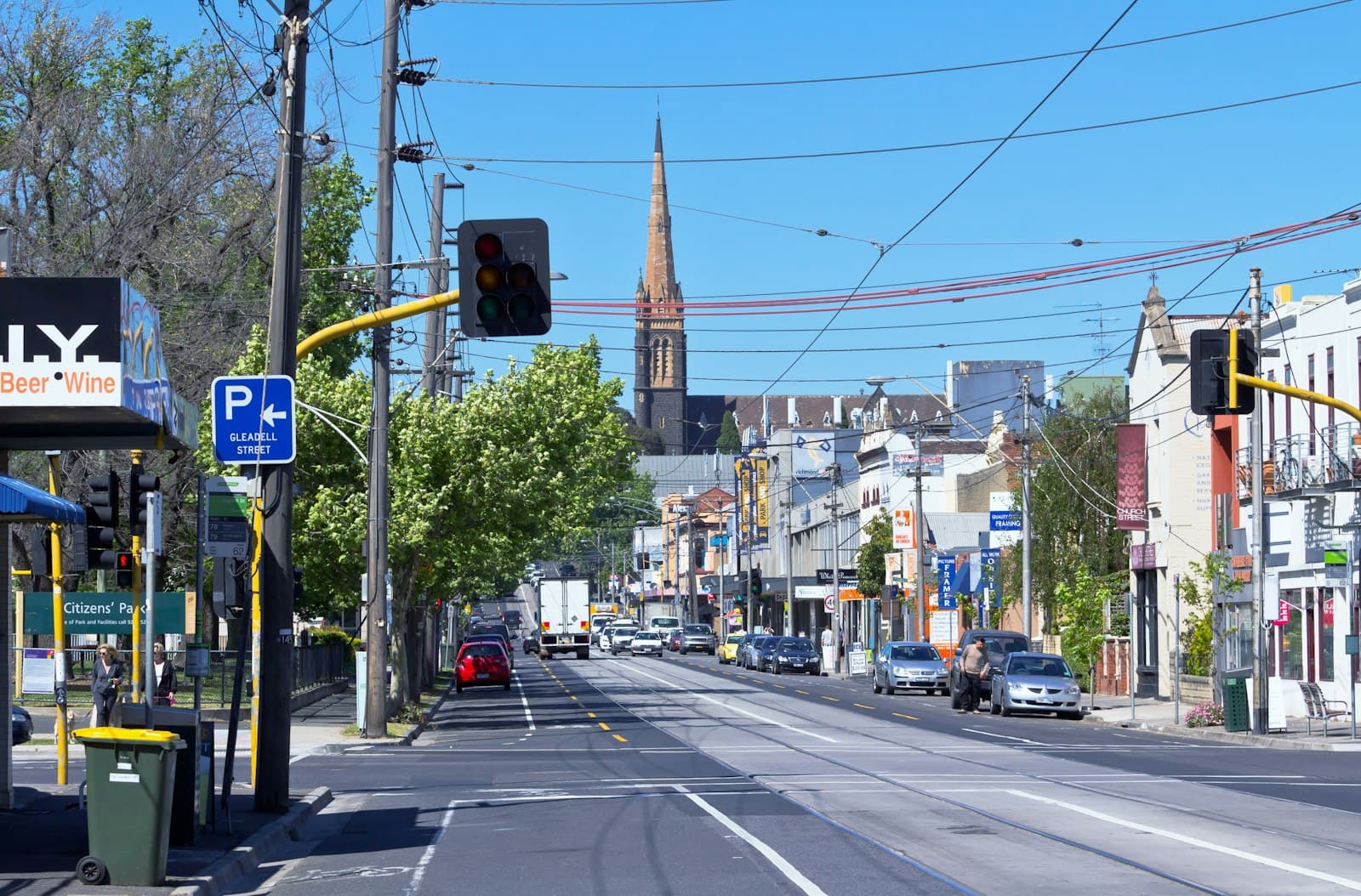 Richmond — A city street filled with lots of traffic next to tall buildings