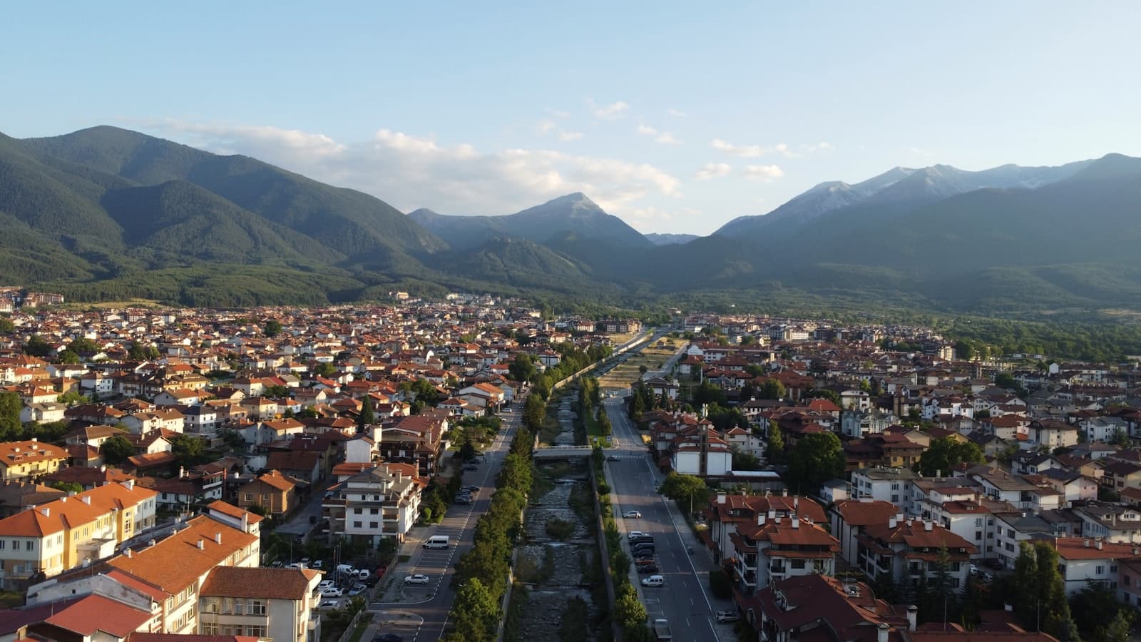 Rila — An aerial view of a city with mountains in the background
