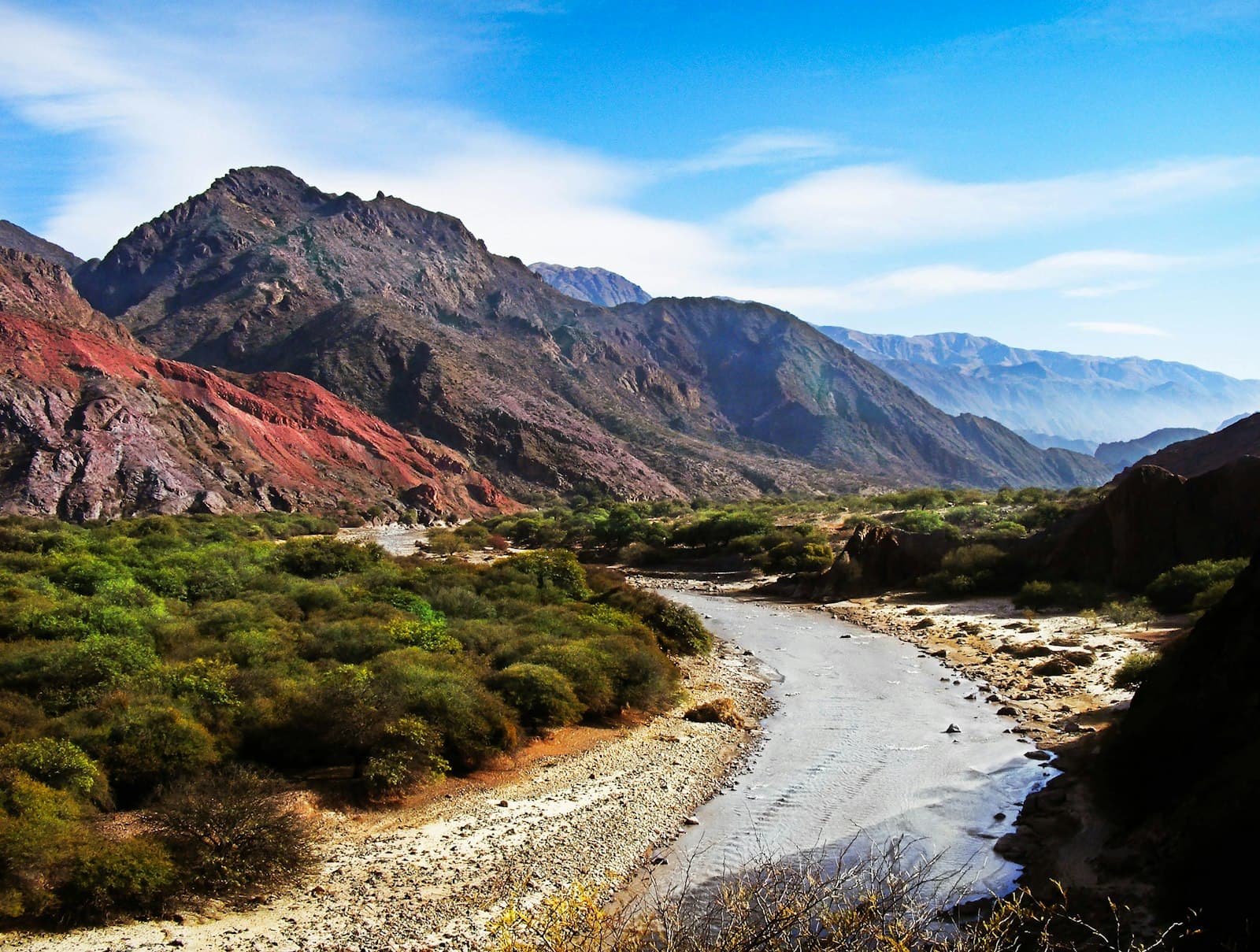Río Gallegos — brown and green mountains under blue sky during daytime