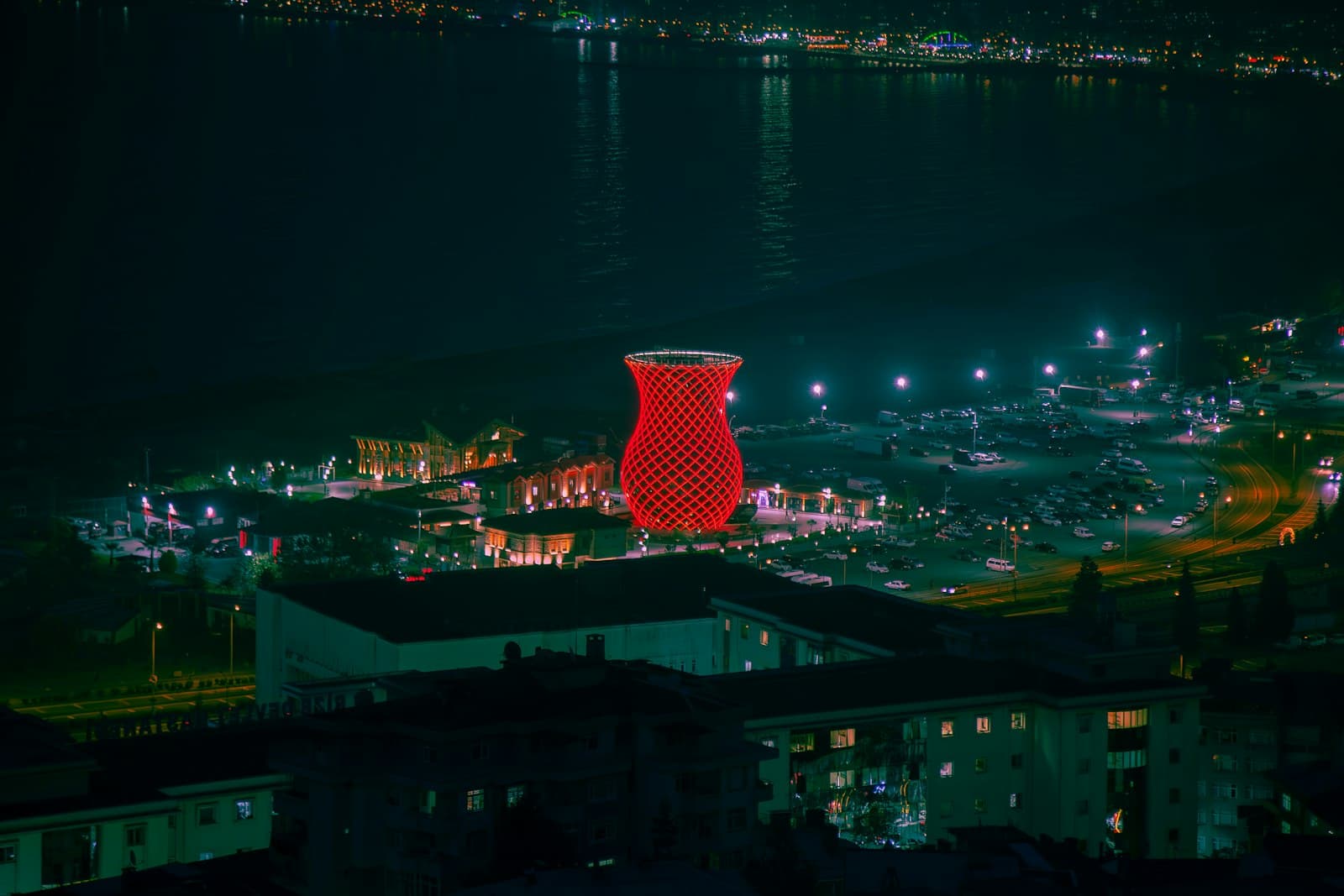 Rize — a tall red tower sitting on top of a lush green hillside
