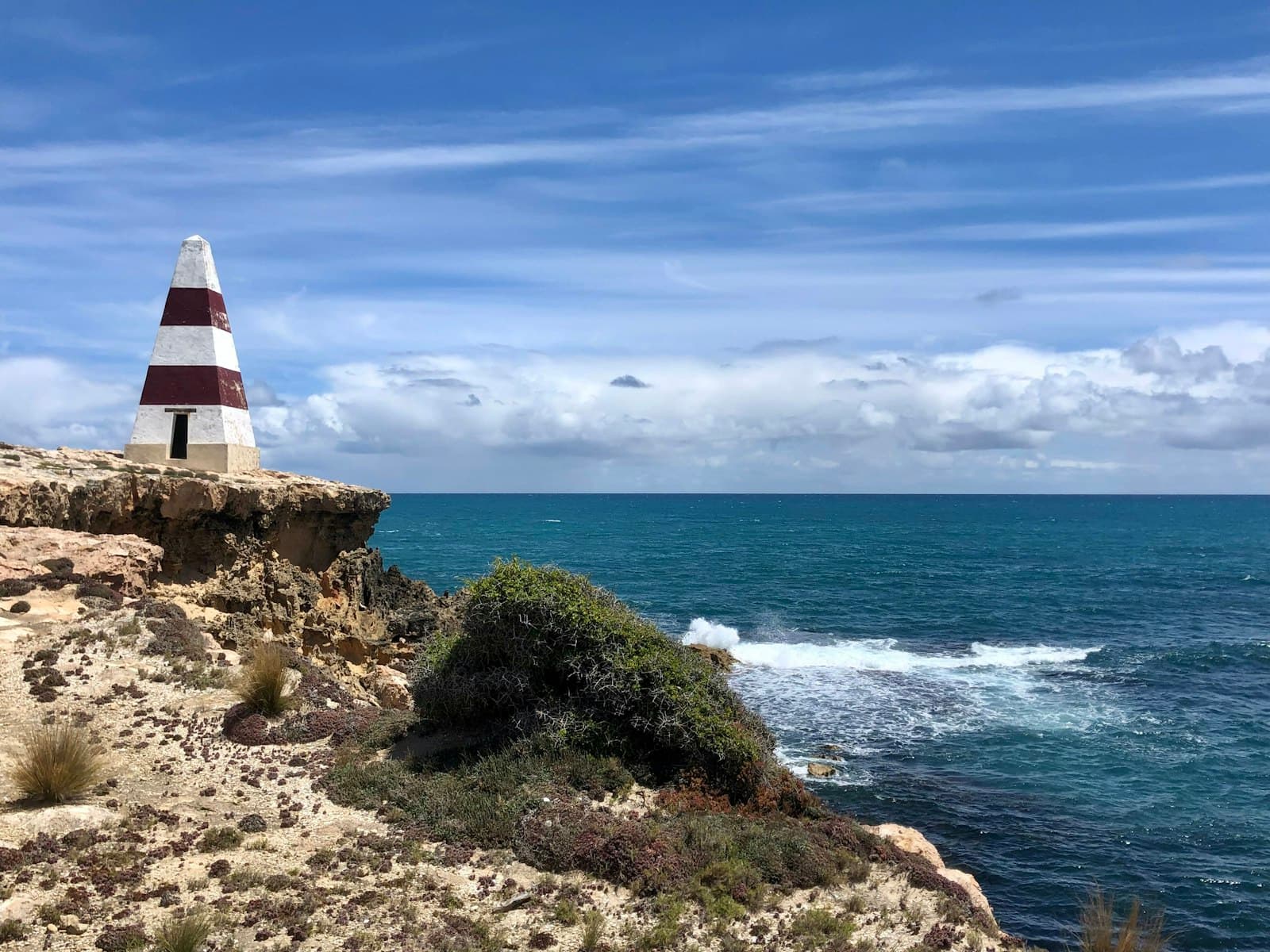 Robe — a lighthouse on a cliff overlooking the ocean