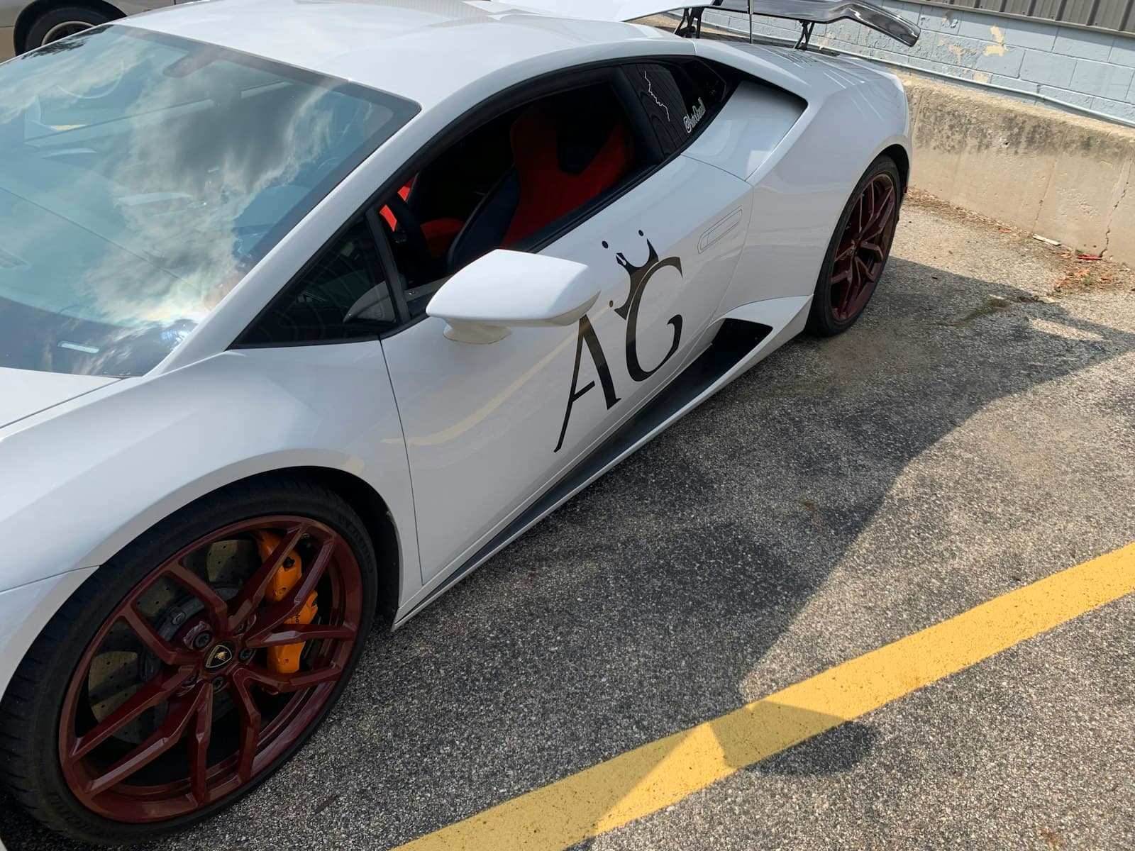 Rockford — a white car with a black and red design on the side