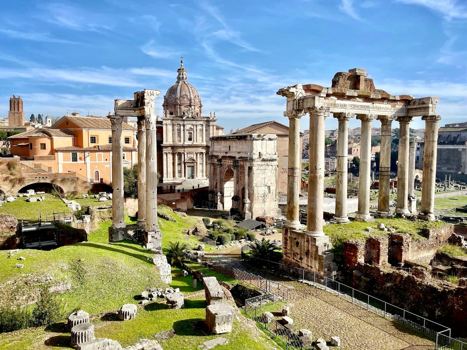 Roman Forum — white concrete building under blue sky during daytime