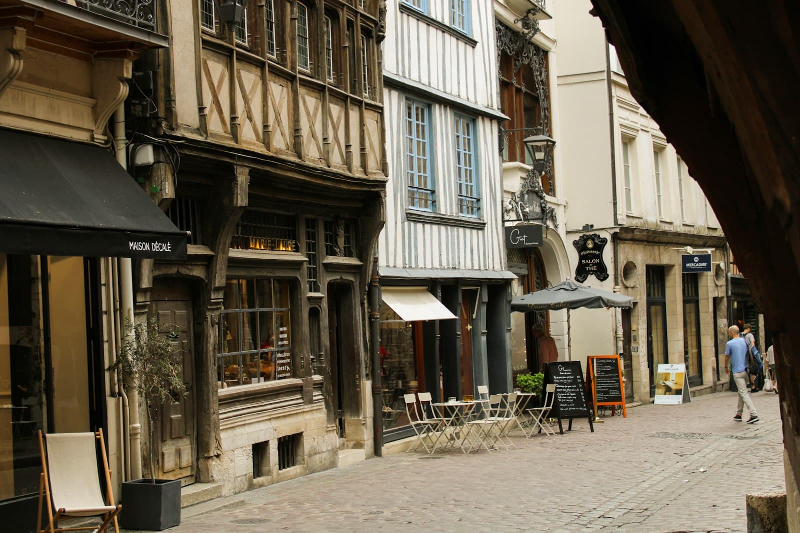 Rouen — a person walking down a street