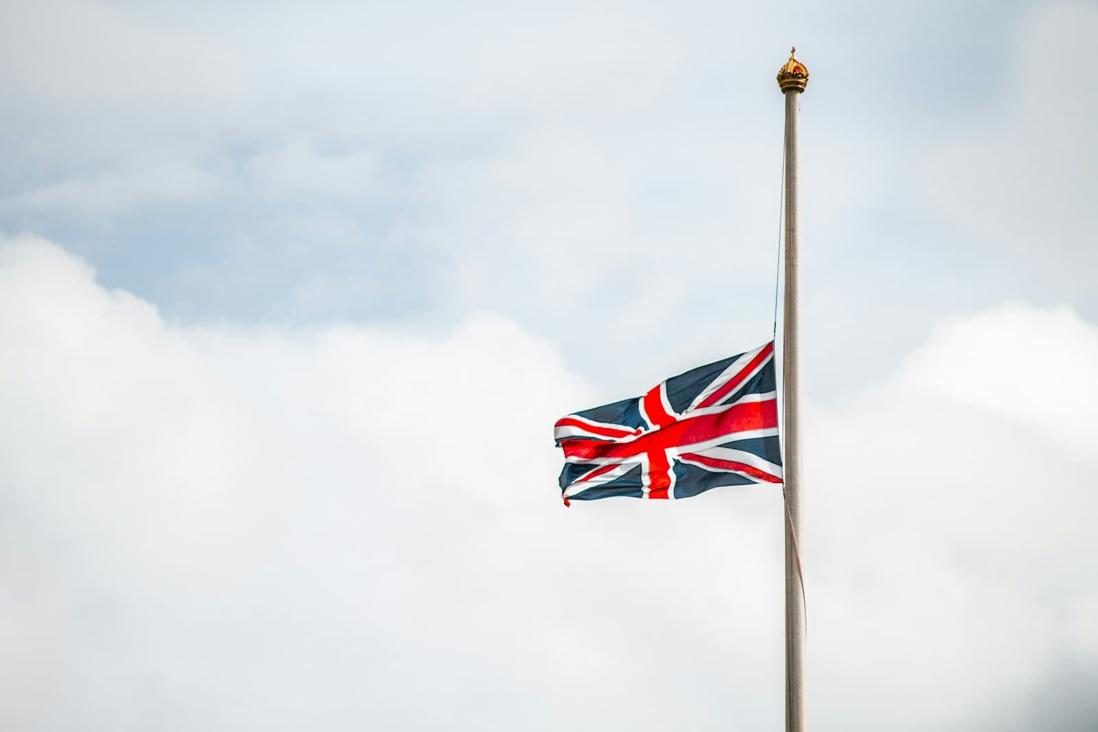 Rye — us a flag under white clouds
