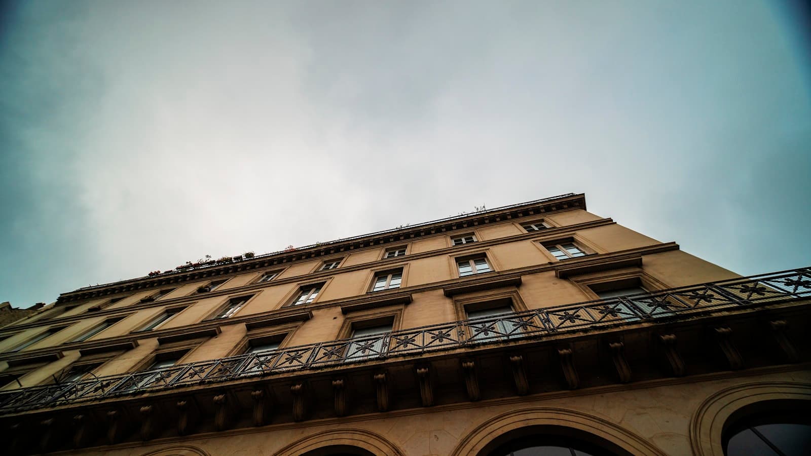 Saint-Denis — brown concrete building under white sky during daytime