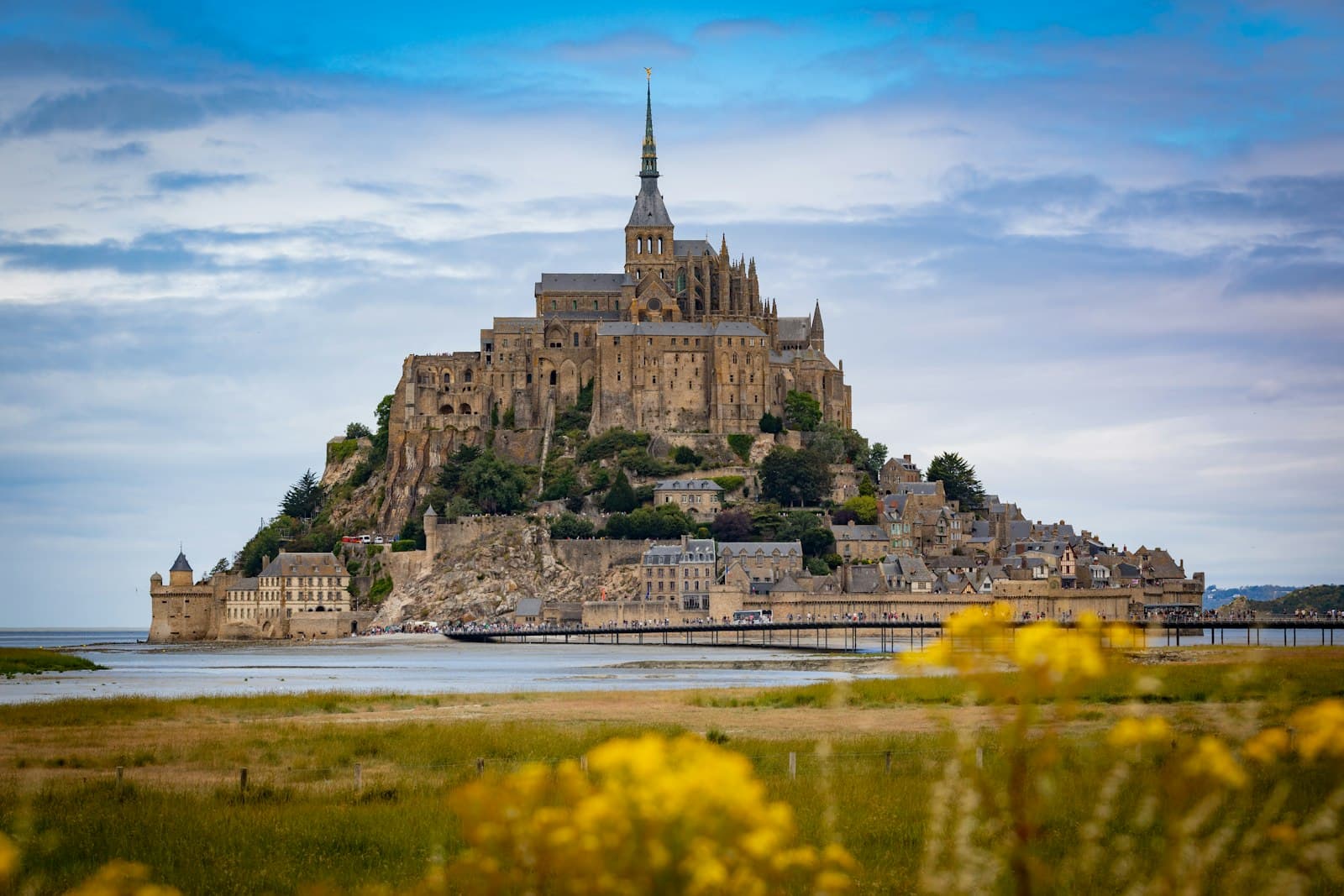 Saint-Émilion — brown concrete building near body of water during daytime