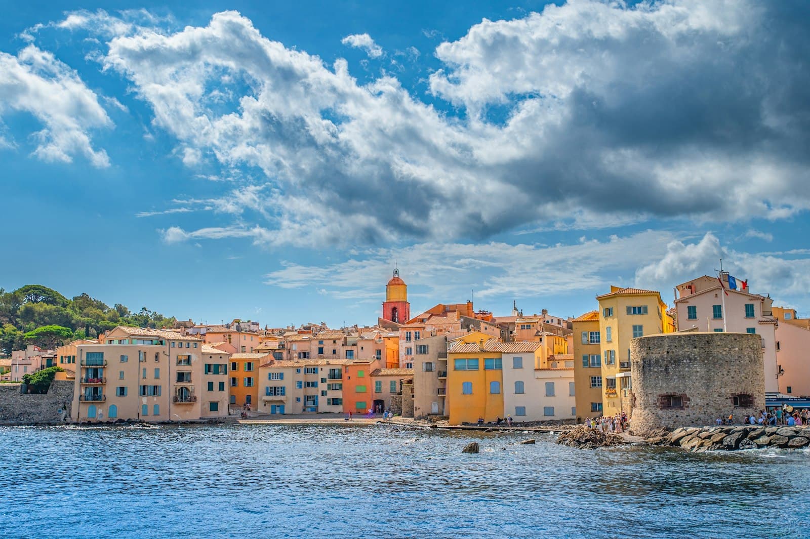 Saint-Tropez — a group of buildings next to a body of water