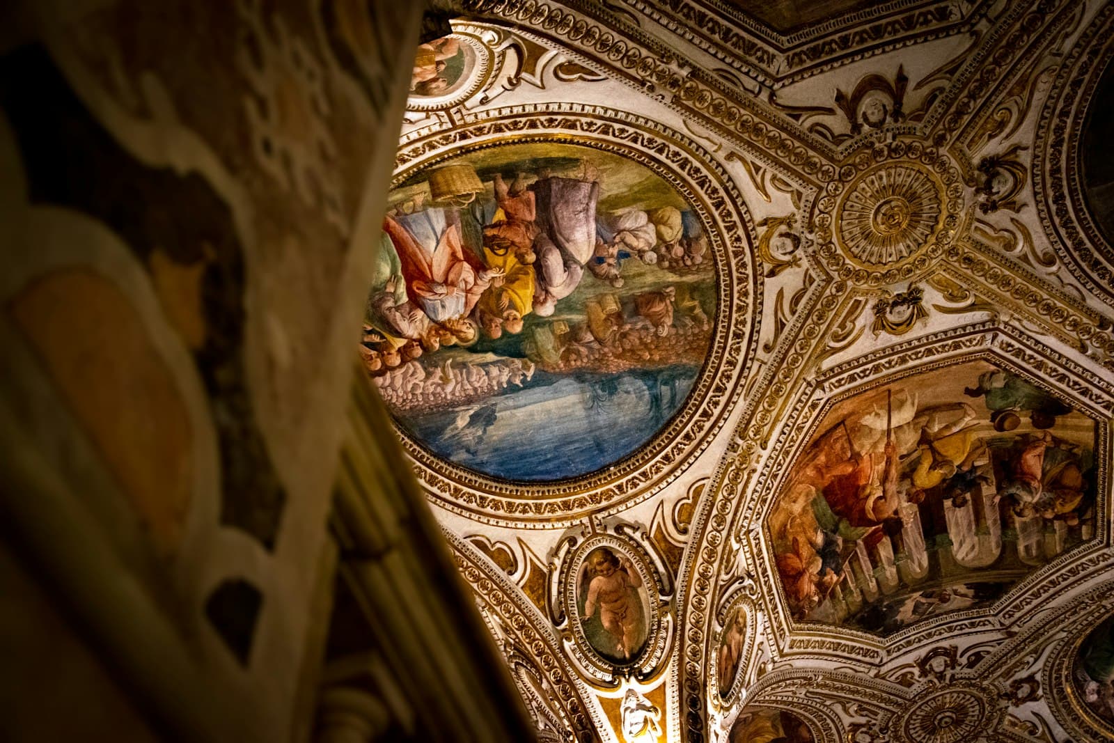 Salerno — the ceiling of a building with paintings on it