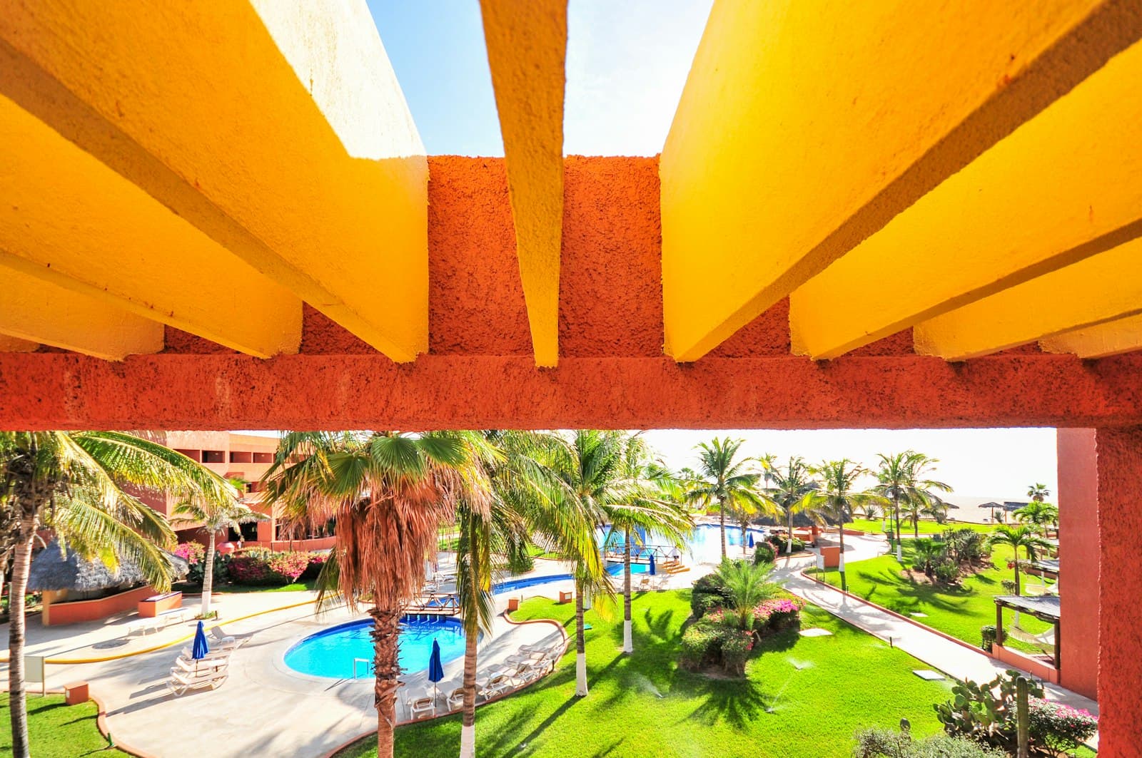 San José del Cabo — yellow concrete building near green trees during daytime