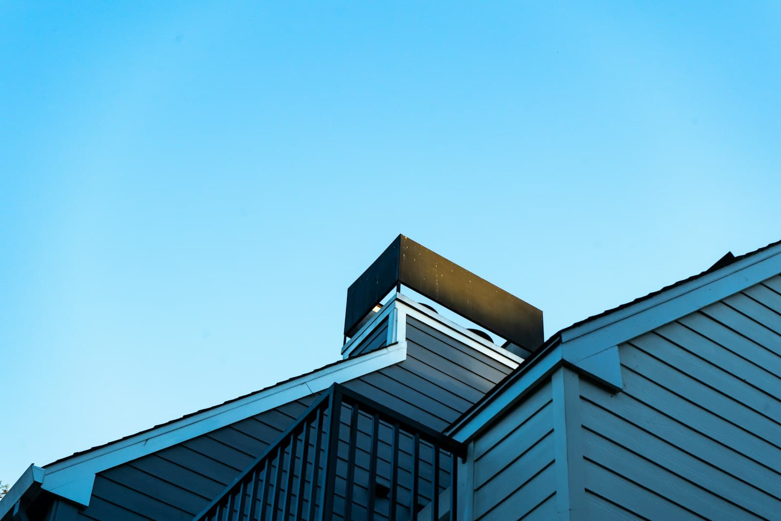 San Jose — a building with a metal roof and a sky background