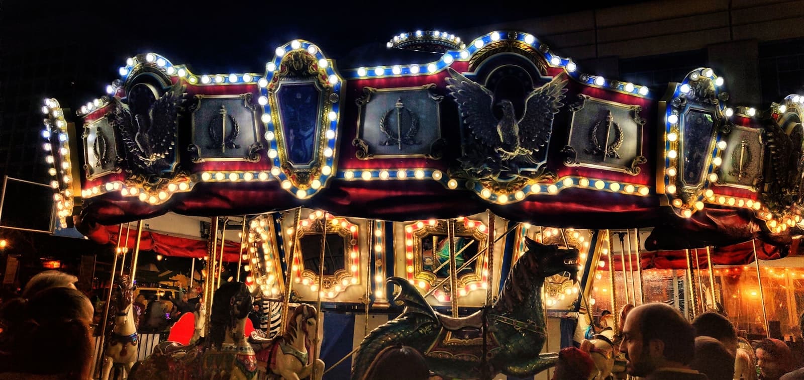 San Jose — white and red carousel with people riding