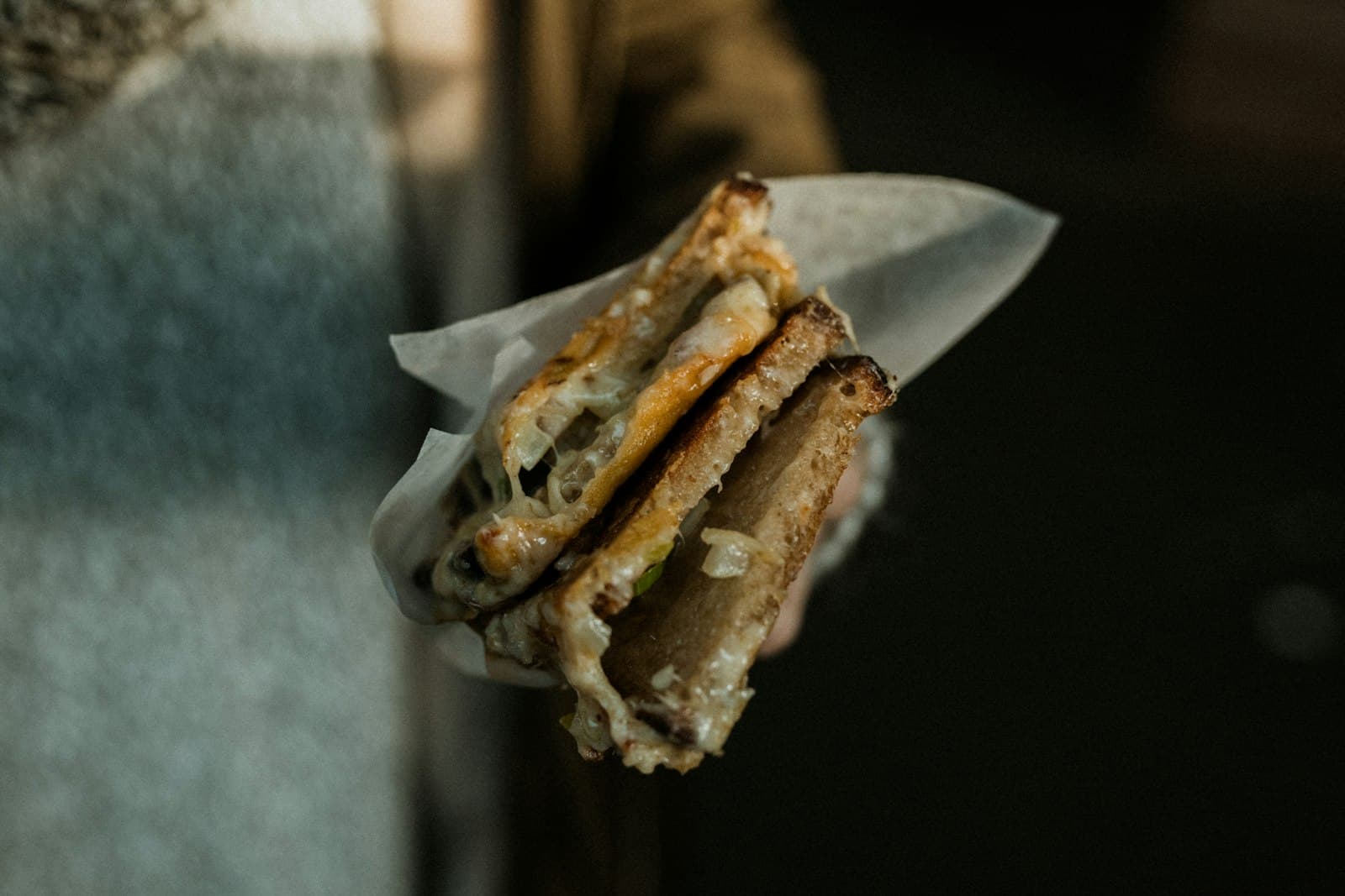 Sandwich — brown bread on white paper