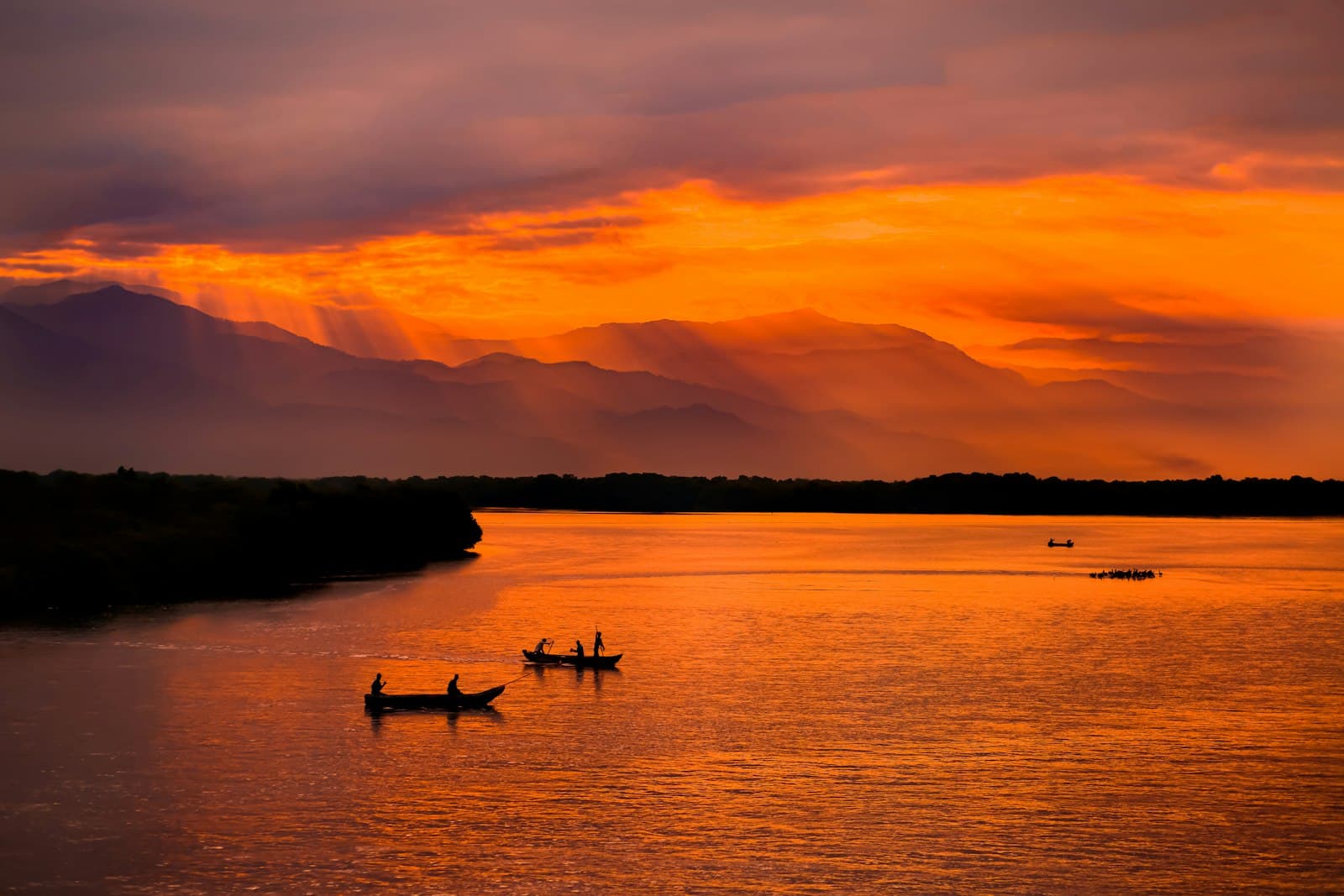 Santa Marta — a couple of boats floating on top of a lake