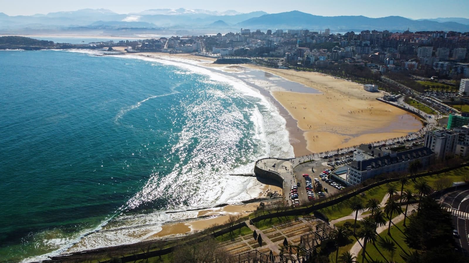 Santander — an aerial view of a beach with a city in the background
