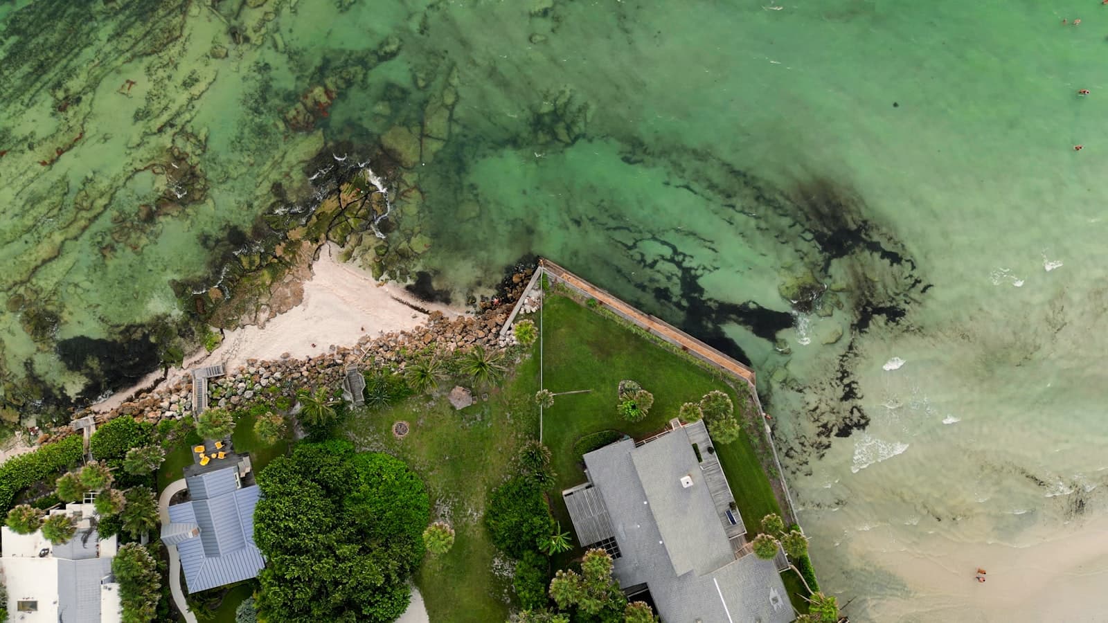 Sarasota — an aerial view of a house next to the ocean