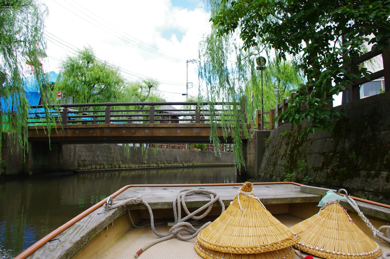 Sawara — Boat approaching a bridge on a canal