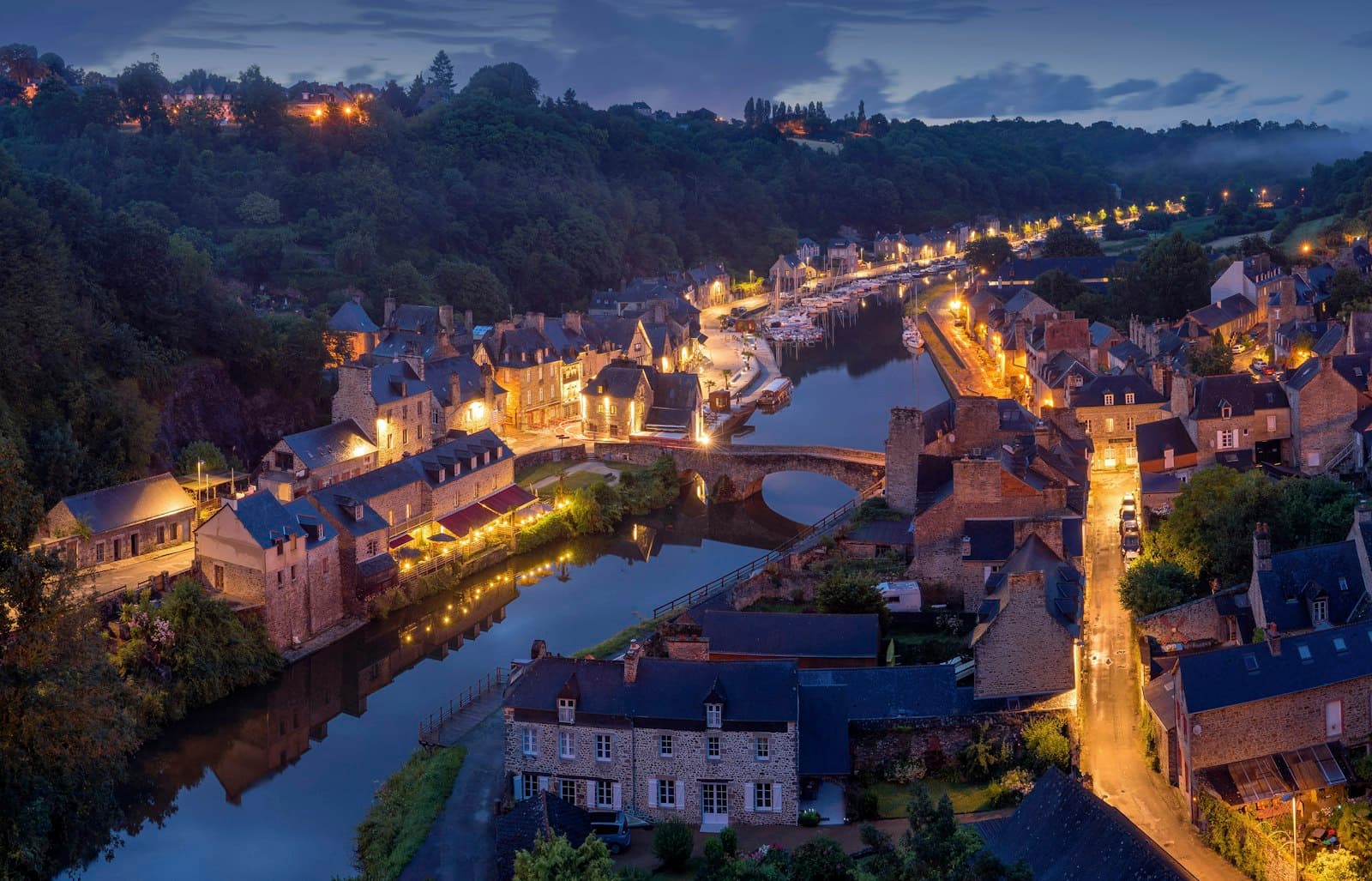 Senlis — aerial photography of lighted concrete buildings at night time