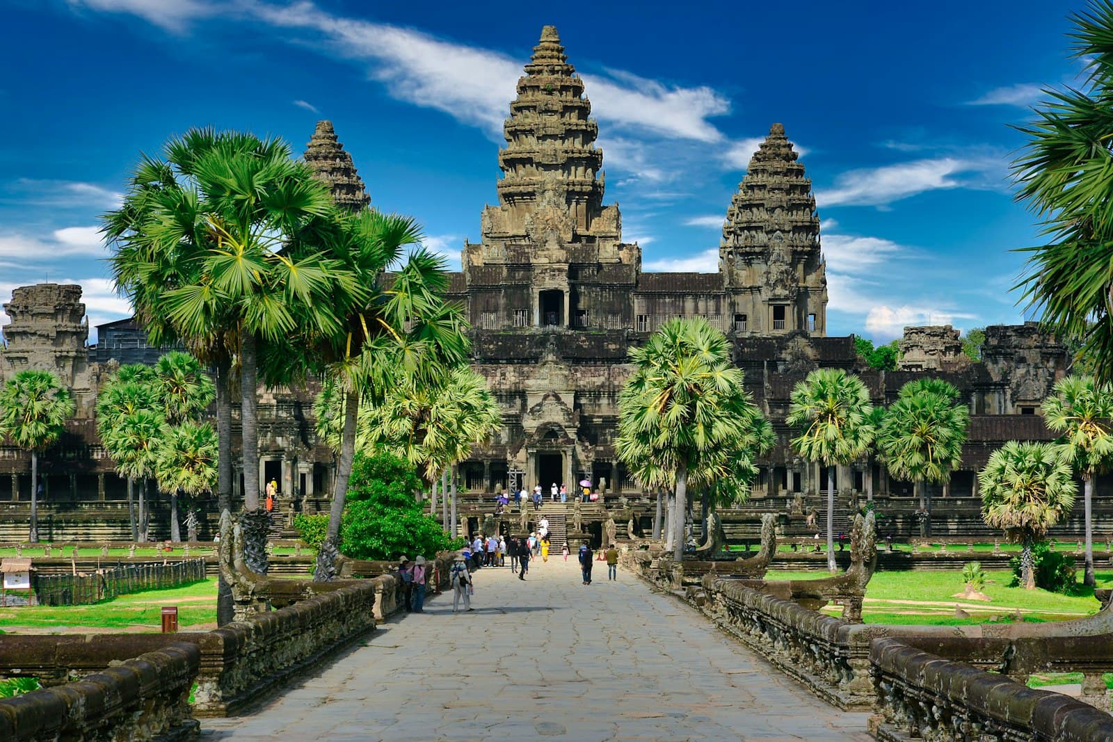 Siem Reap — people walking on park near trees and building during daytime