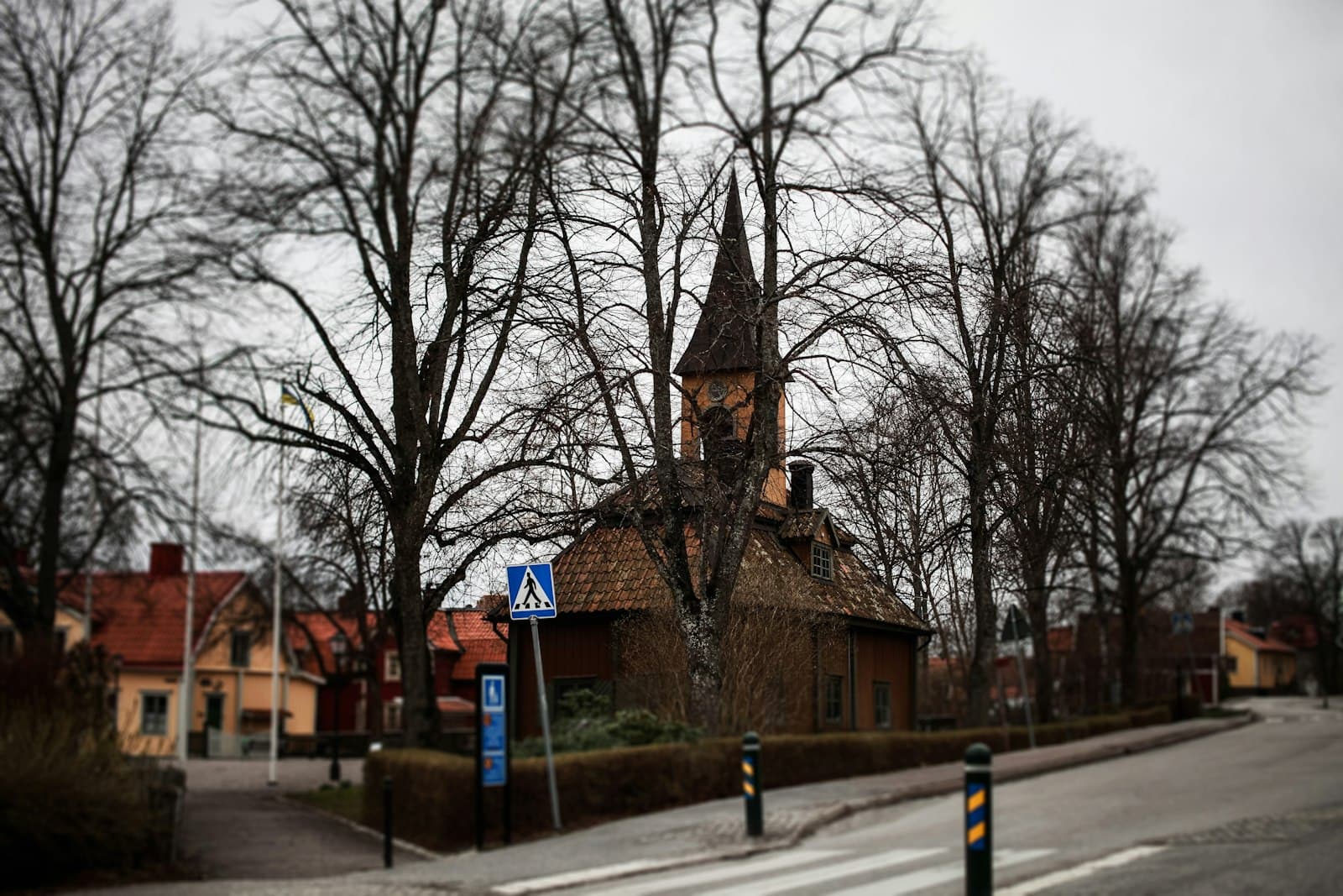 Sigtuna — a small church with a steeple on a street corner