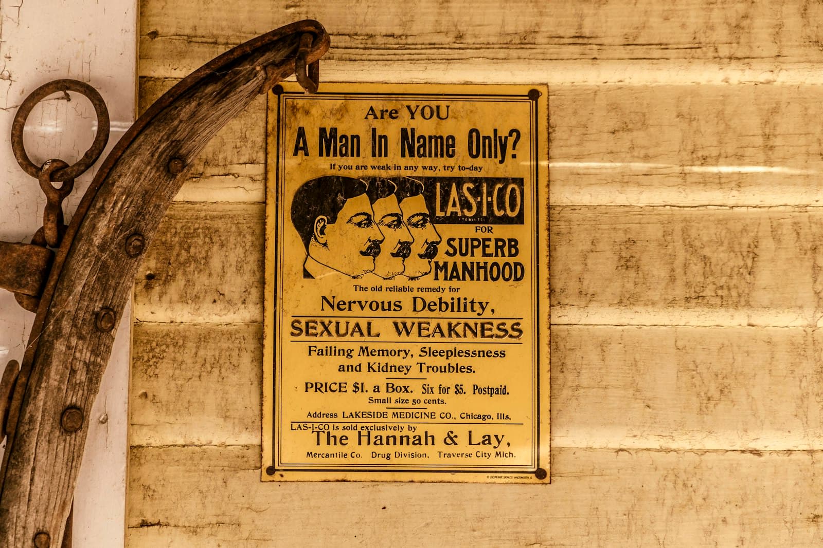 Silver City — An old advertisement promises "superb manhood" for men.