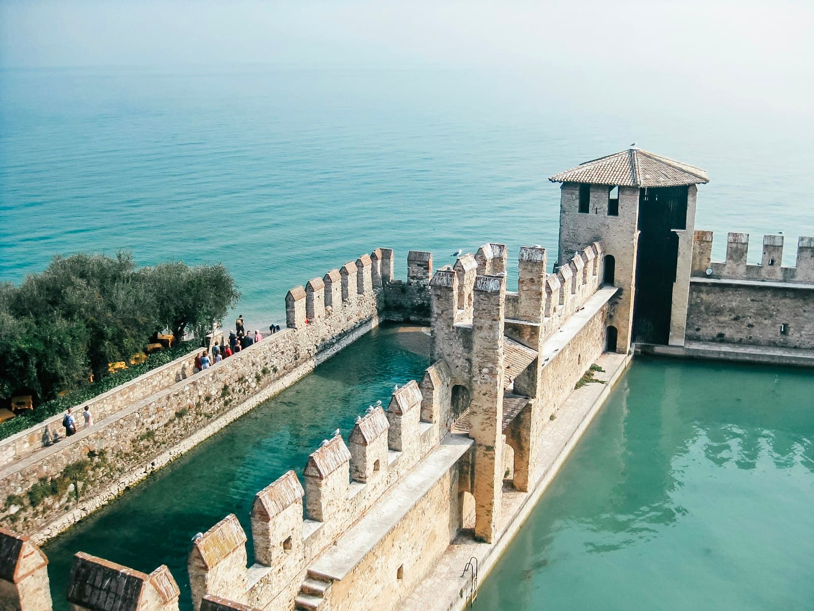 Sirmione — gray building beside body of water