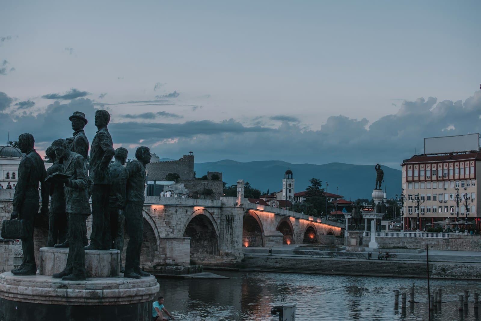 Skopje — a group of statues by a river
