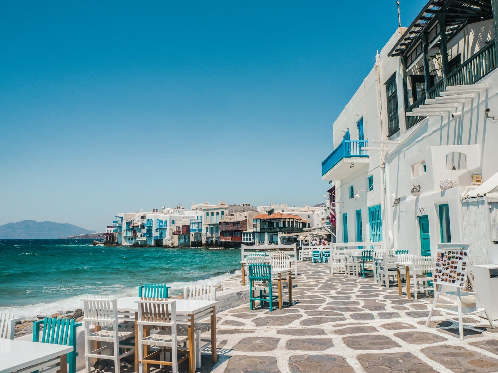 Spetses — white and brown concrete buildings near sea during daytime