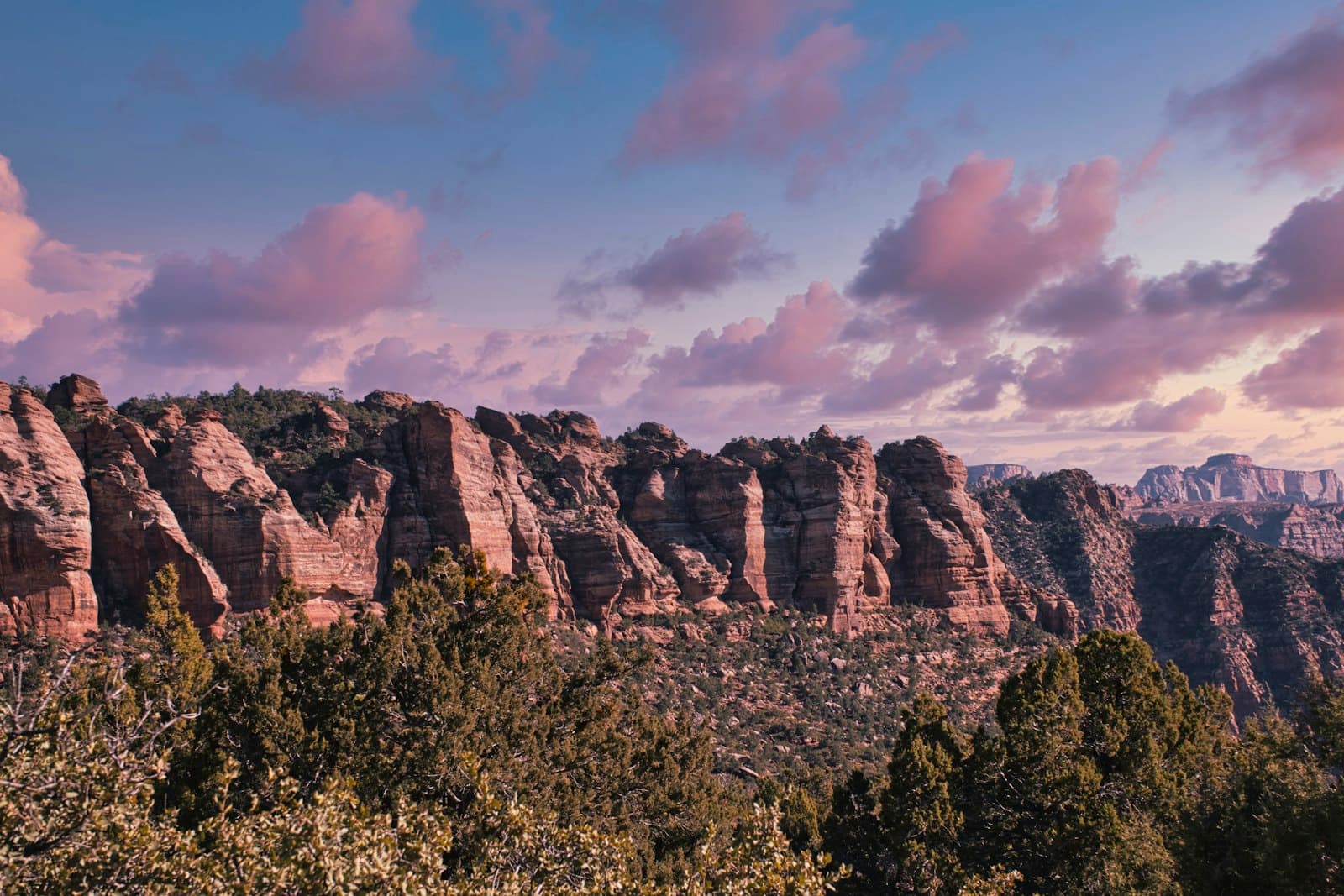 Springdale — brown rocky mountain under cloudy sky during daytime