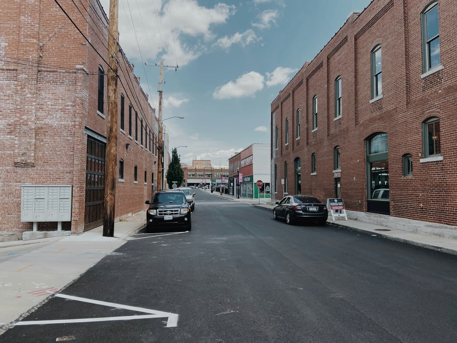 Springfield — cars parked in front of brown building during daytime