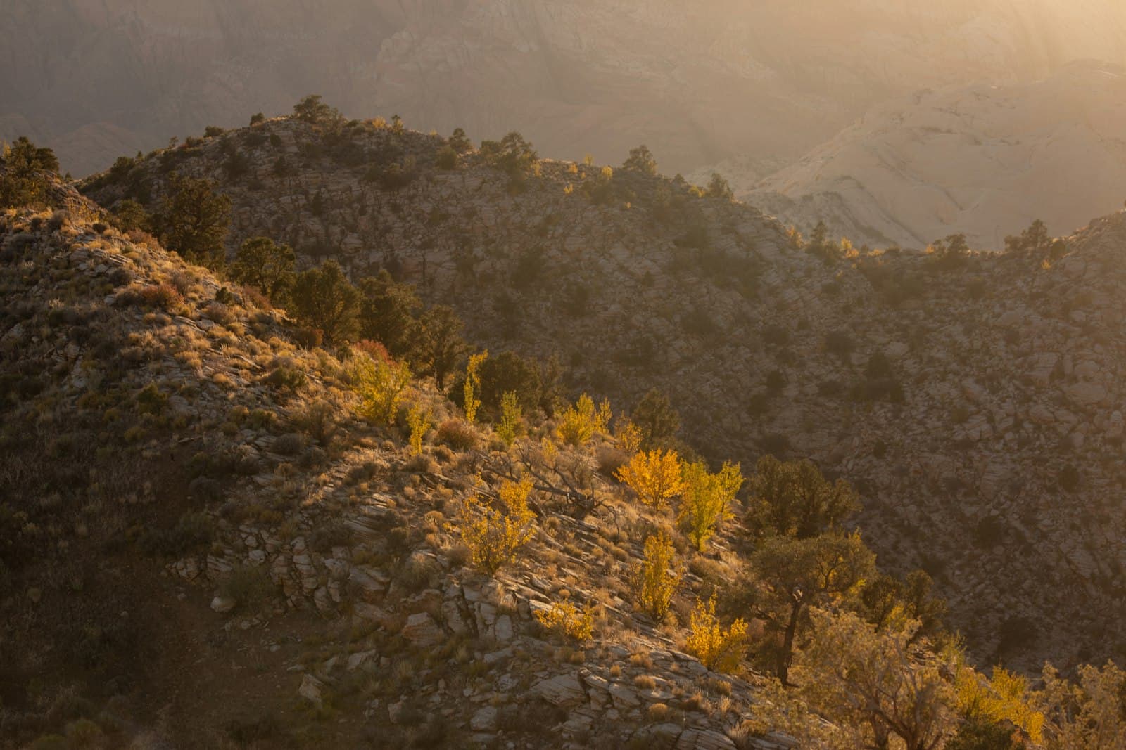 St. George — the sun shines on a rocky mountain side