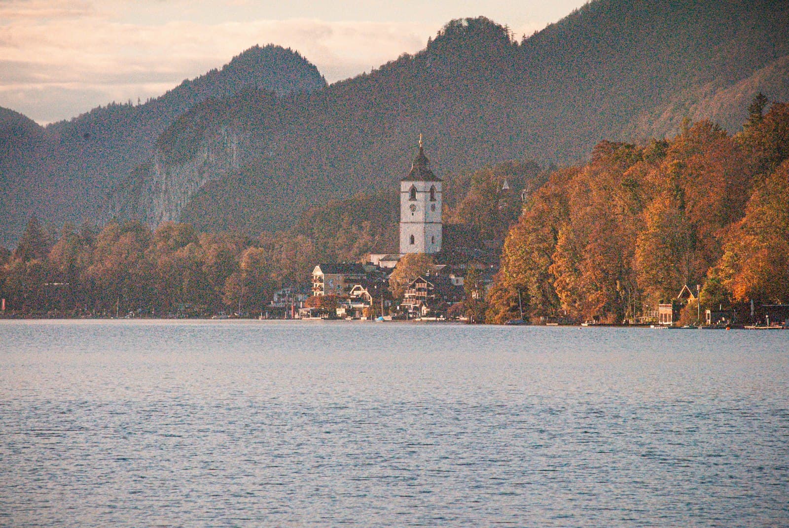 St. Wolfgang — a building on a hill by a body of water