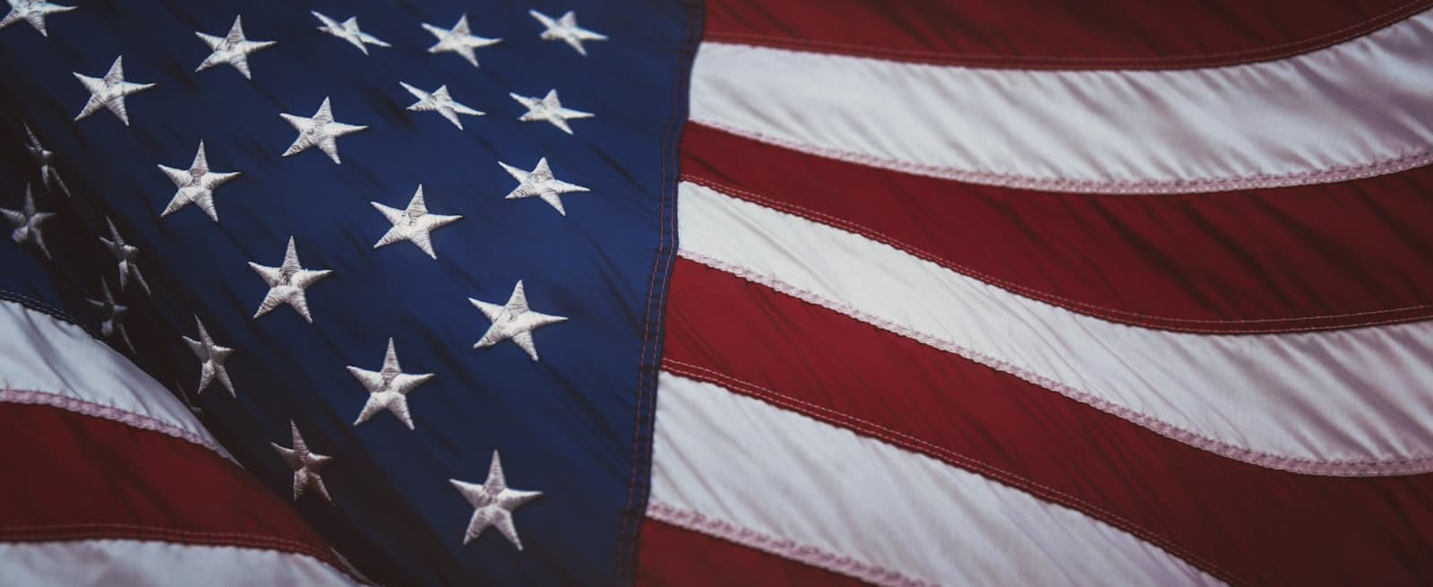 Stowe — us a flag on white and red striped textile