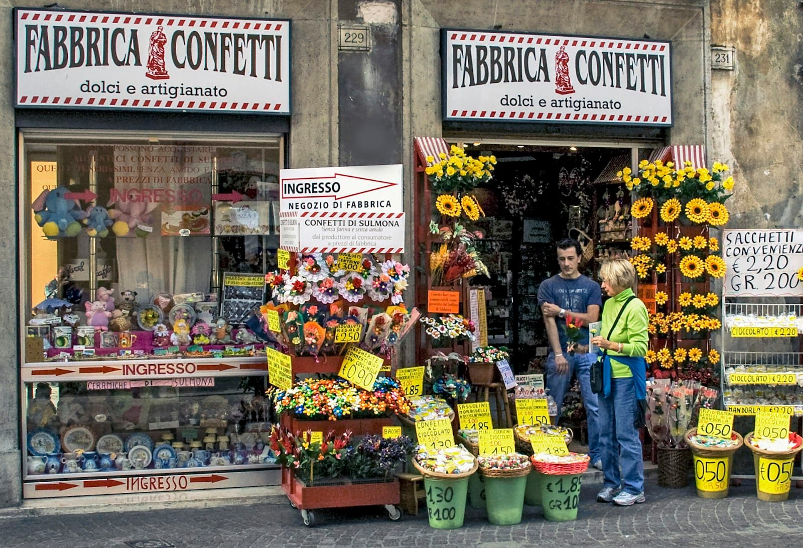 Sulmona — man in blue jacket standing in front of store