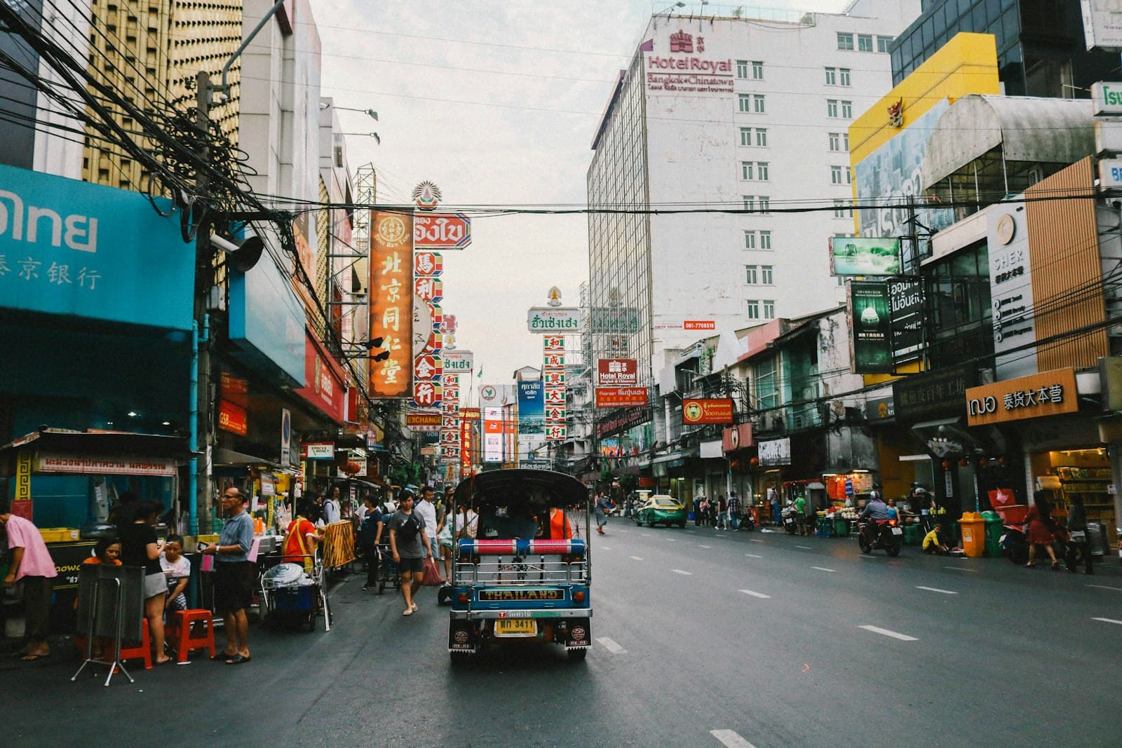 Surat Thani — people walking at the road outside the buildings