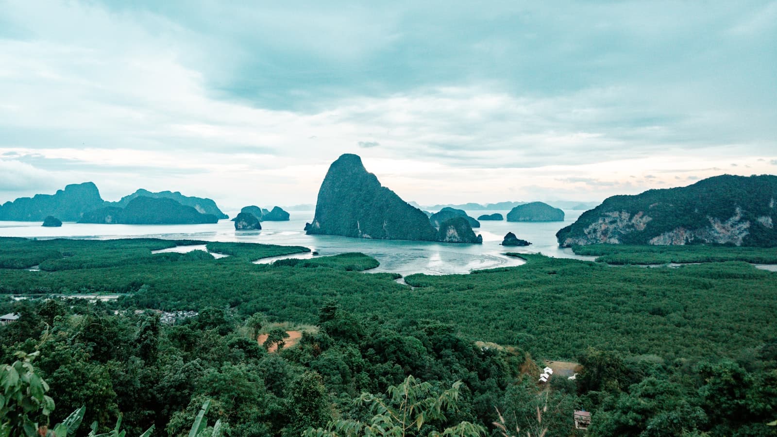 Surat Thani — an aerial view of an island with a body of water surrounded by trees