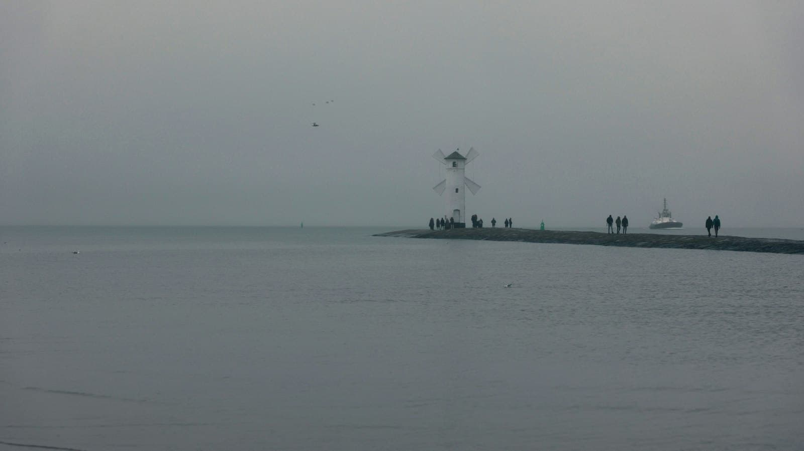 Świnoujście — A large body of water with a boat in the distance