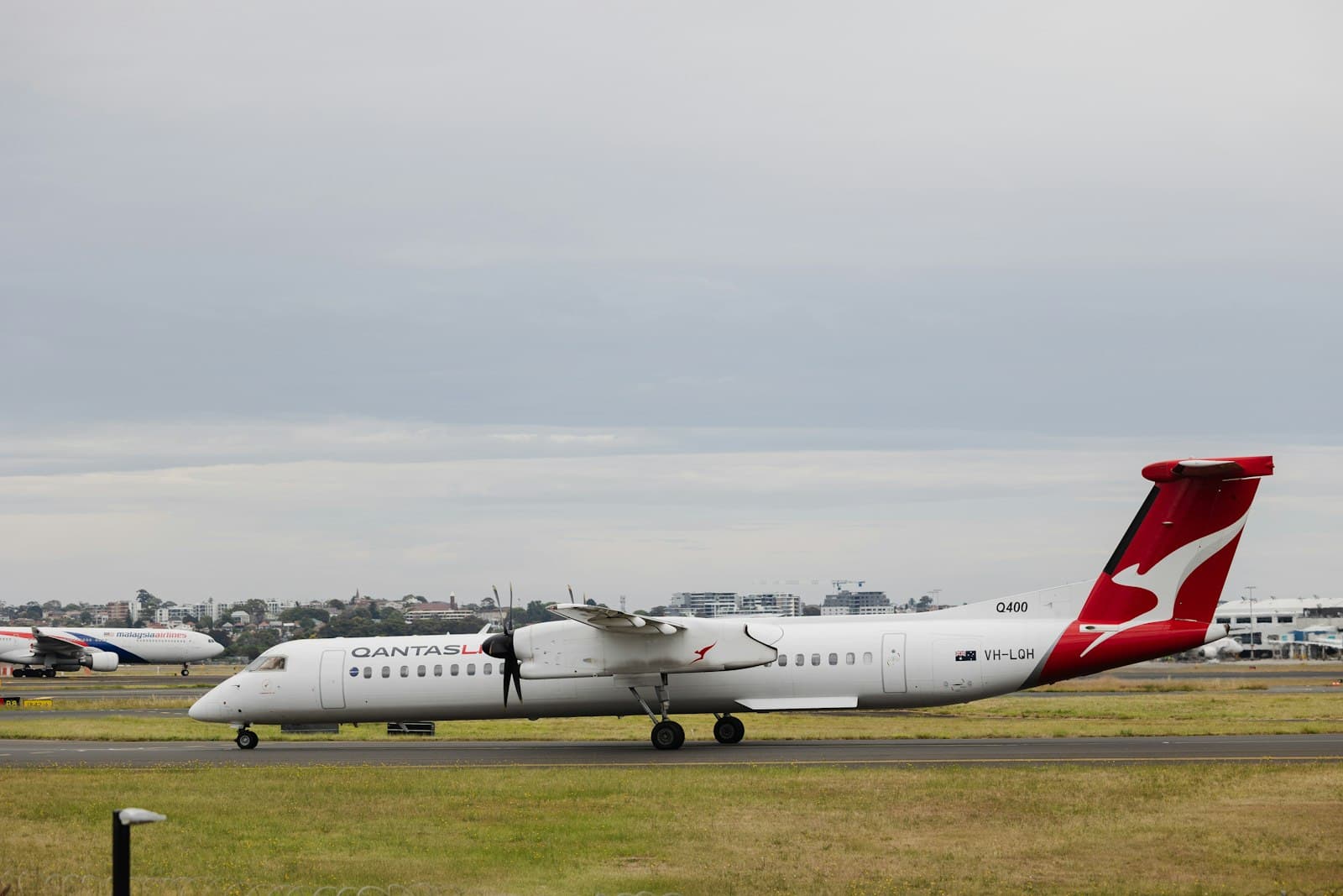 Sydney — a large white airplane on a runway