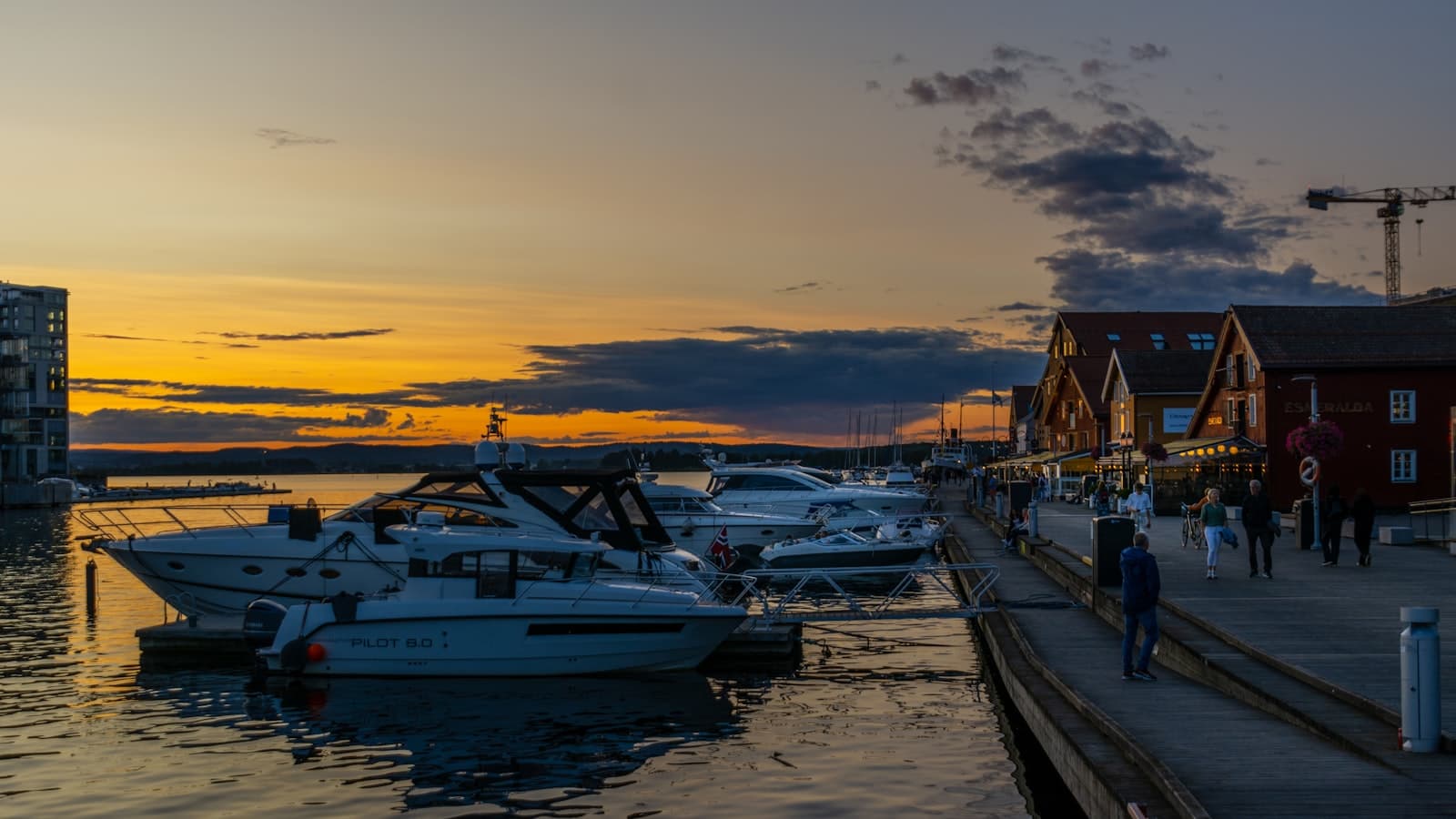 Tønsberg — a group of boats parked next to a pier