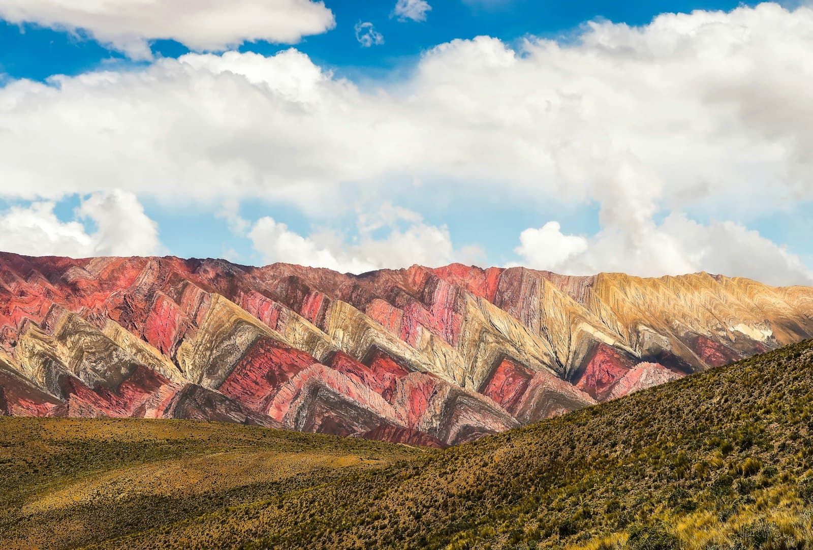 Tafí del Valle — brown and gray mountains under white clouds and blue sky during daytime