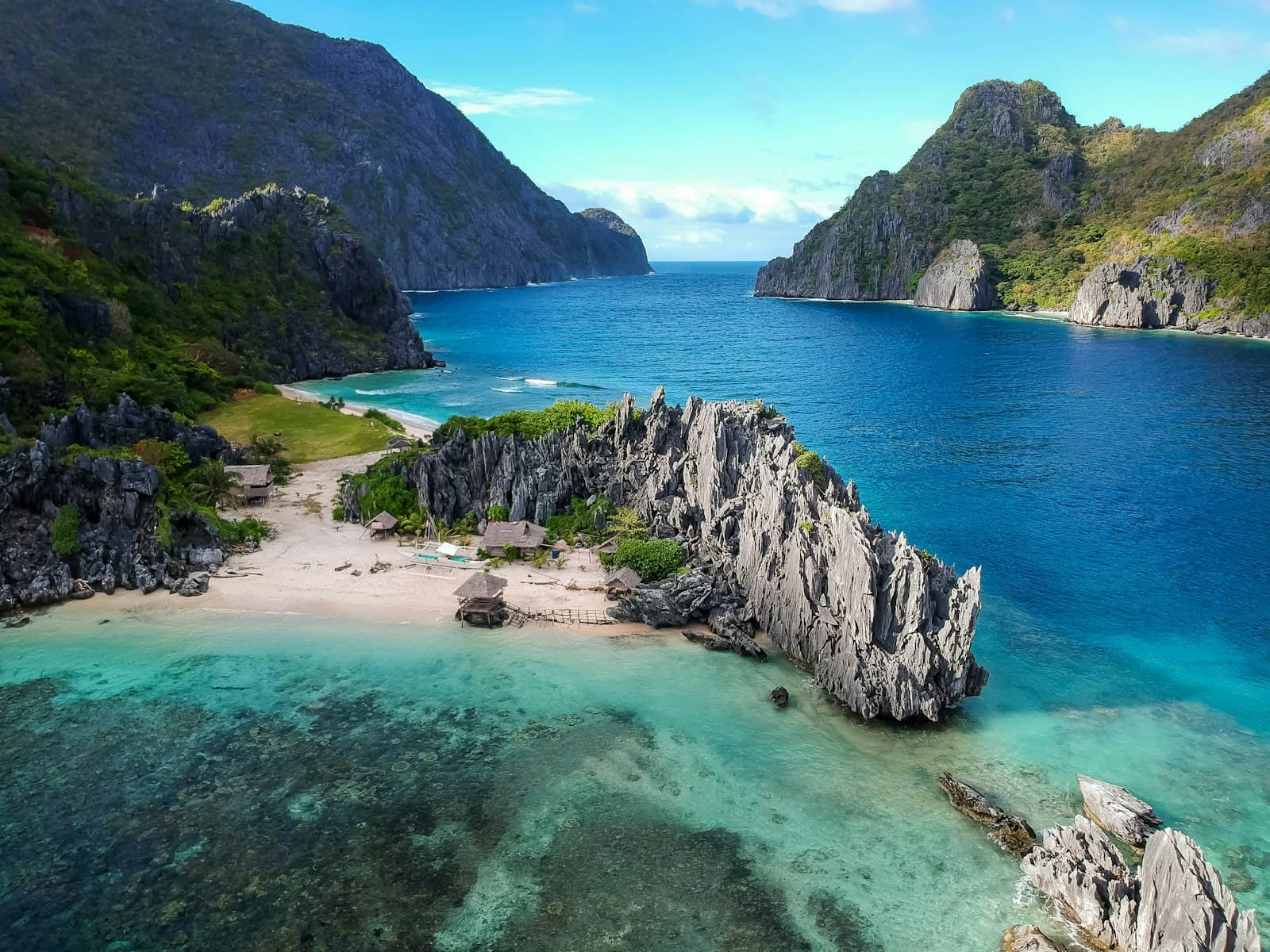 Tagaytay — aerial photo of body of water between mountains