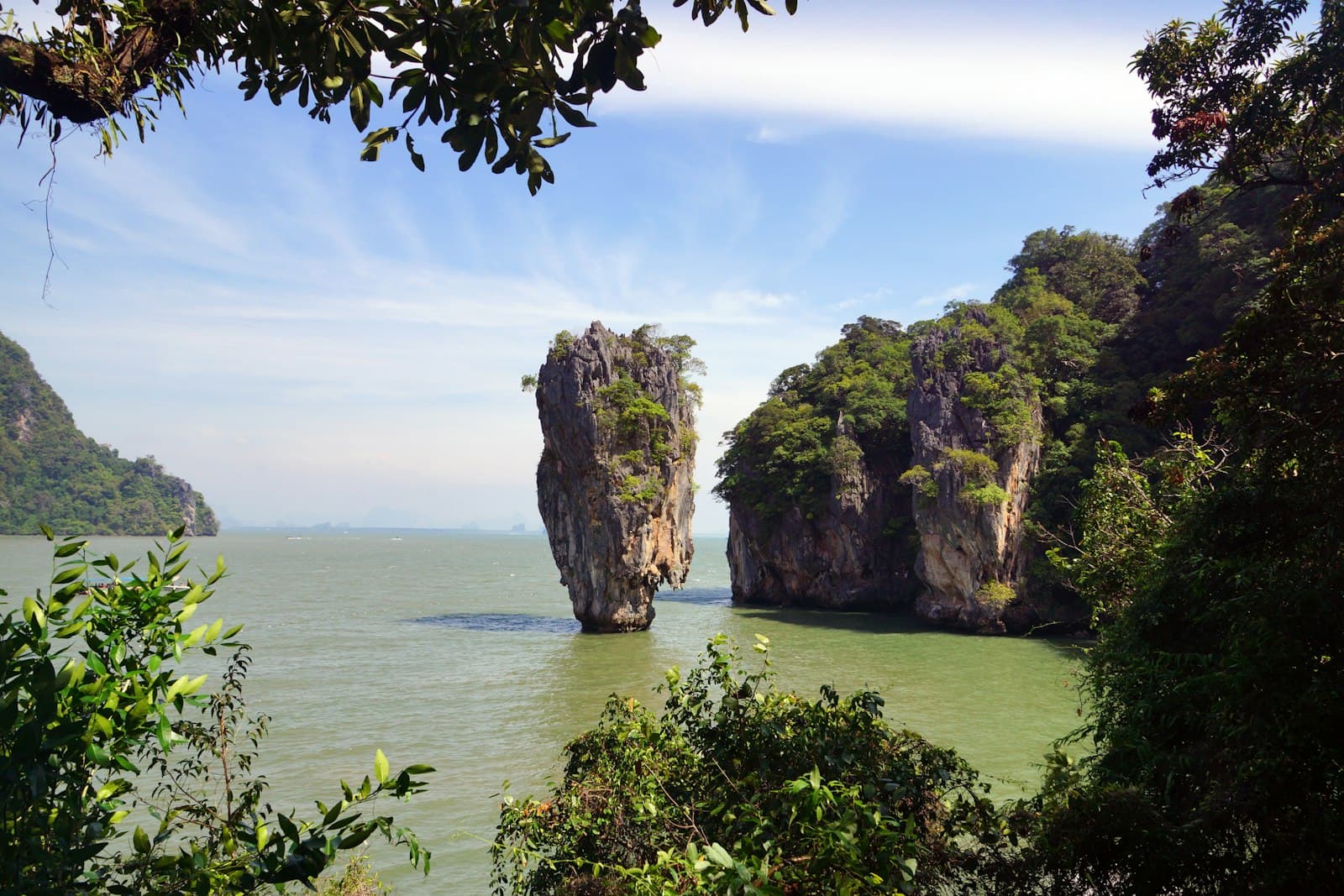 Takua Pa — A body of water surrounded by trees and rocks