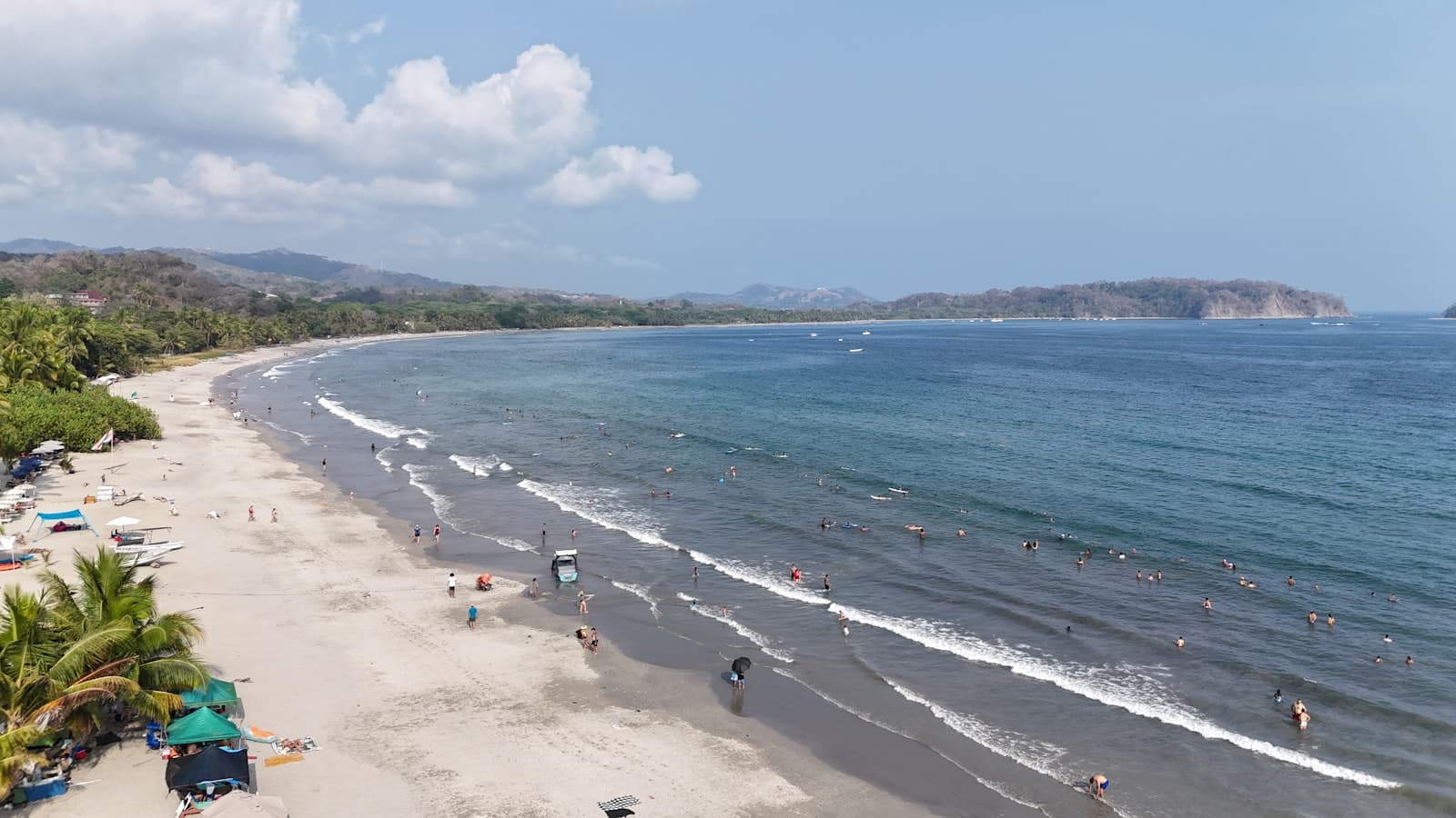 Tamarindo — A beach with a lot of people on it
