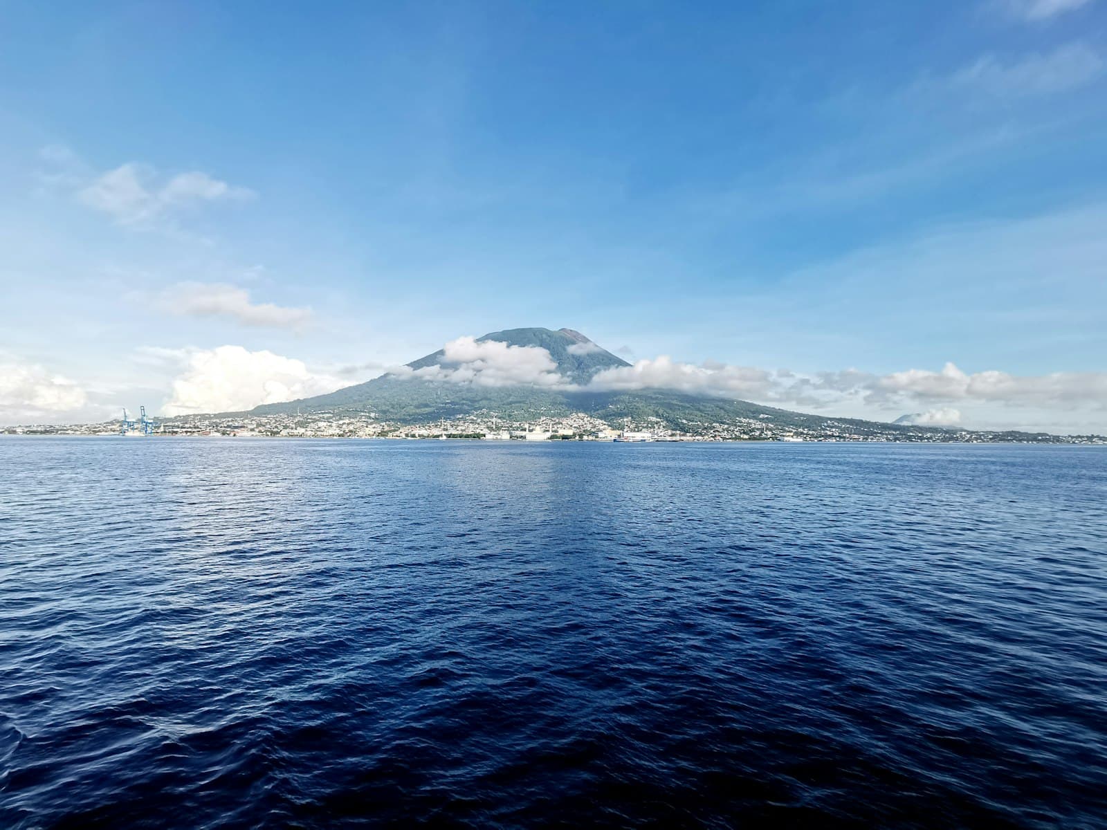 Ternate — a large body of water with a mountain in the background