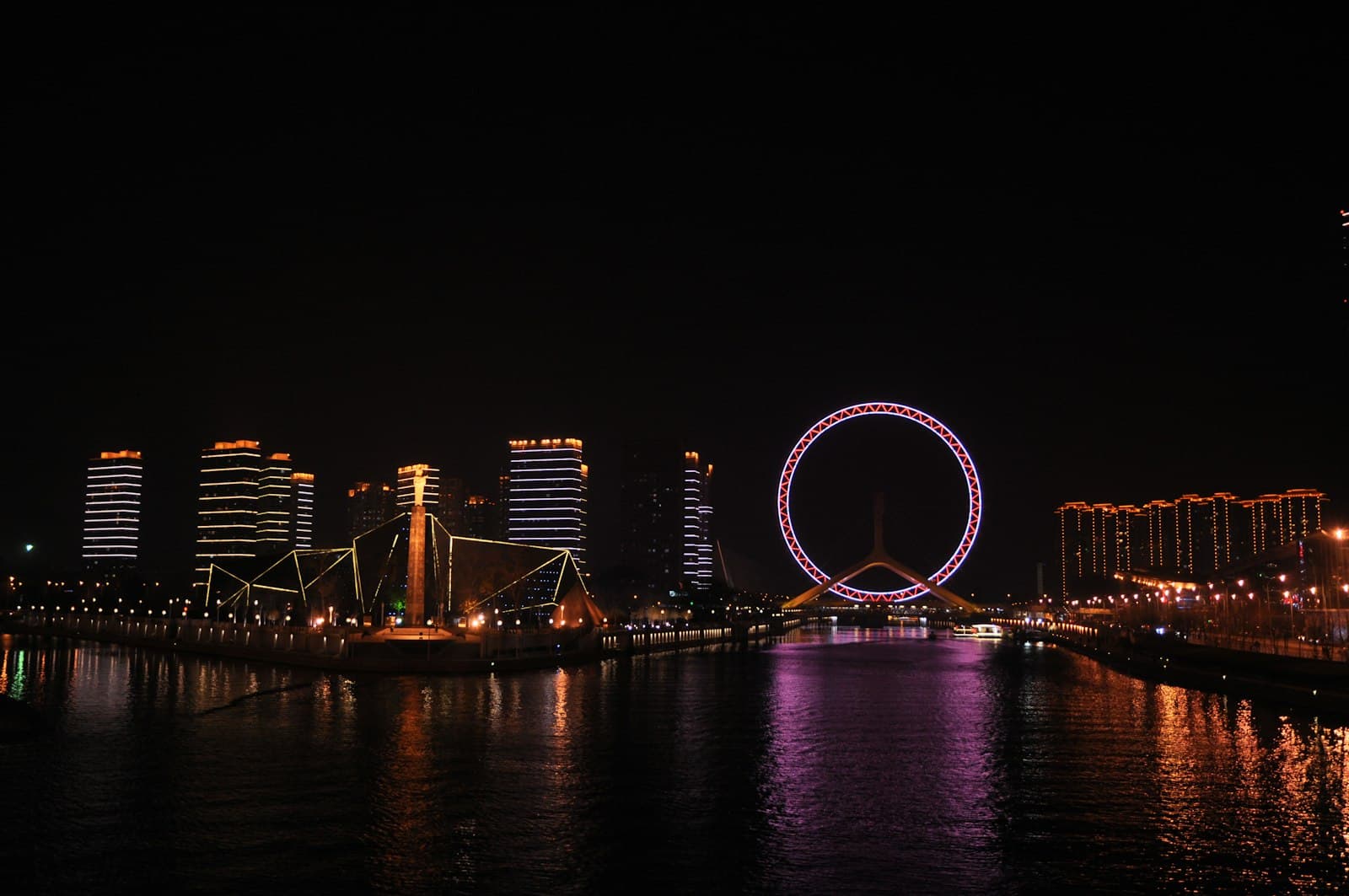 Tianjin — city and ferris wheel with lights during nighttime