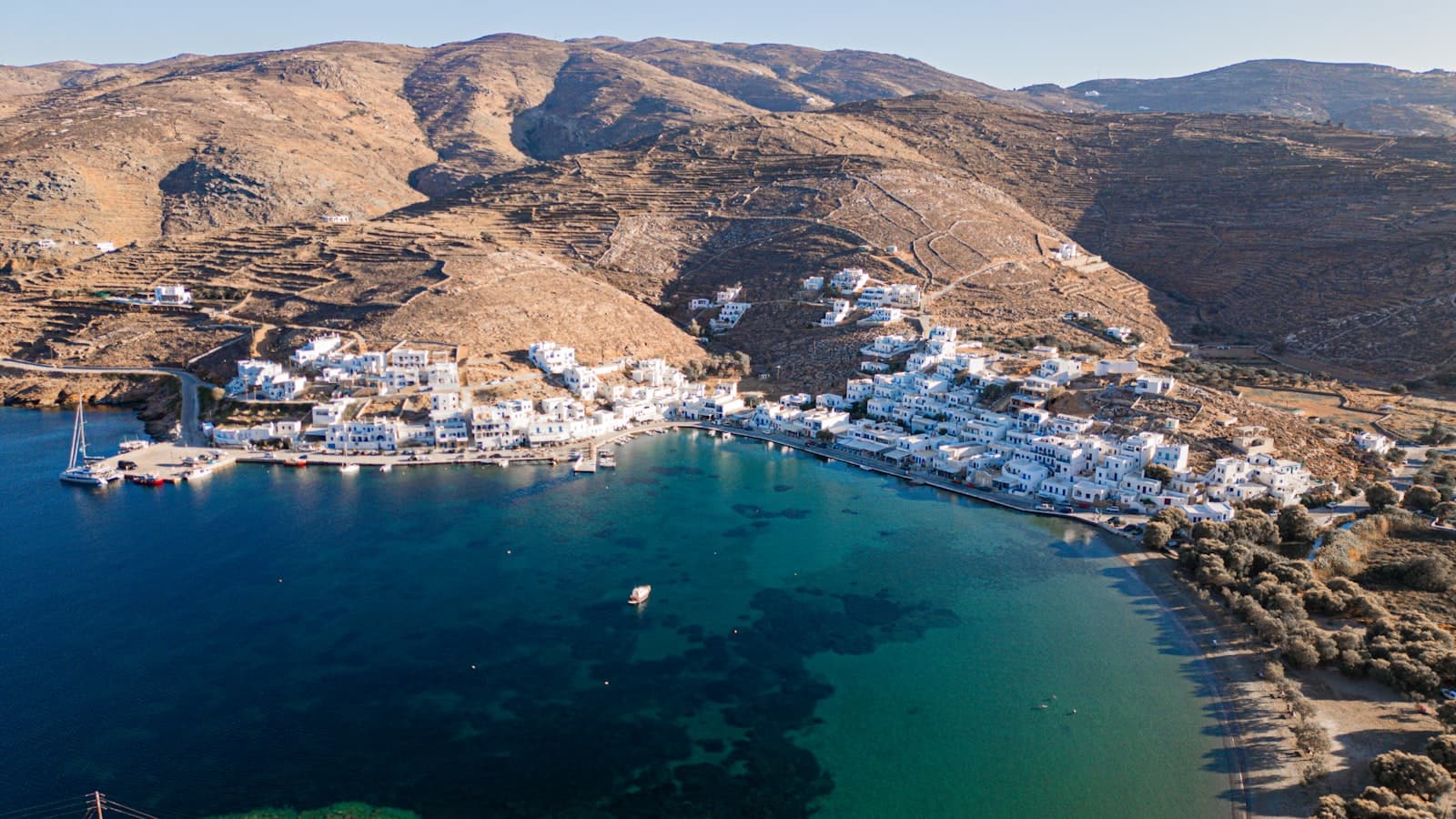 Tinos — A large body of water surrounded by mountains