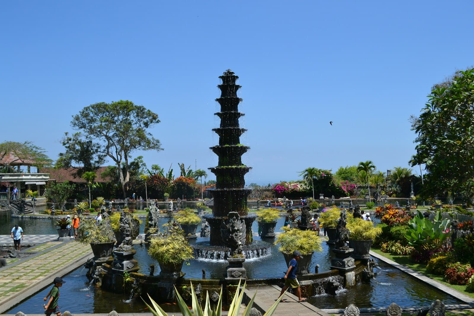 Tirta Gangga — a large fountain surrounded by lots of plants