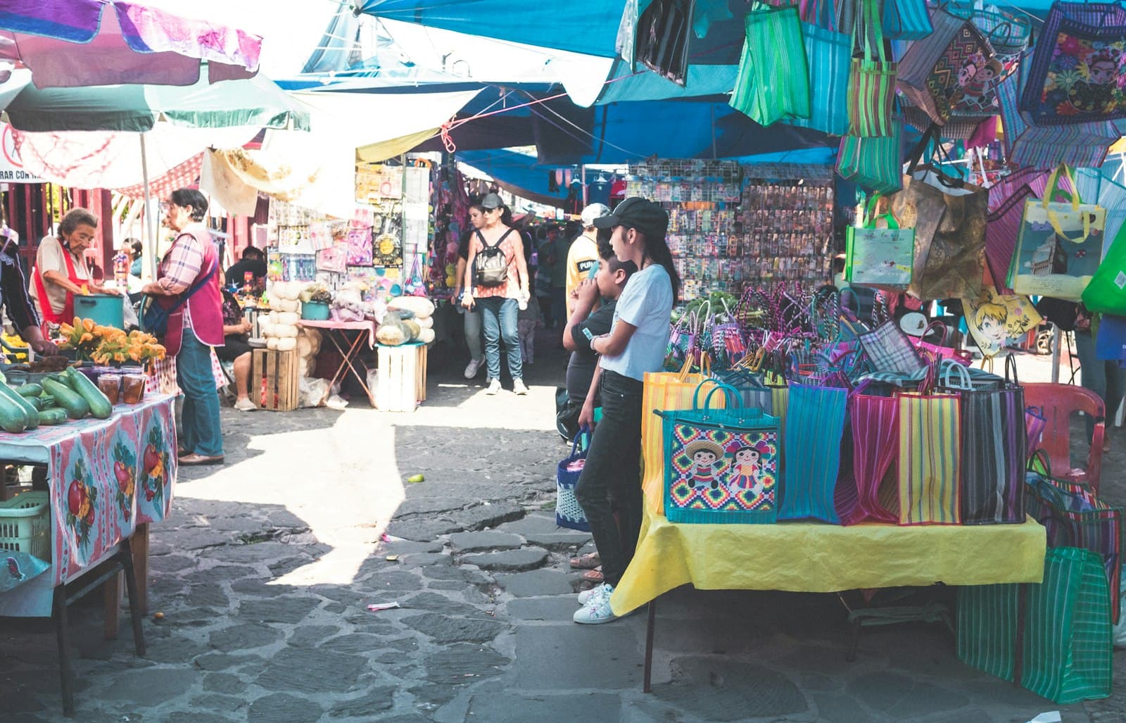 Tlayacapan — a group of people standing around a market