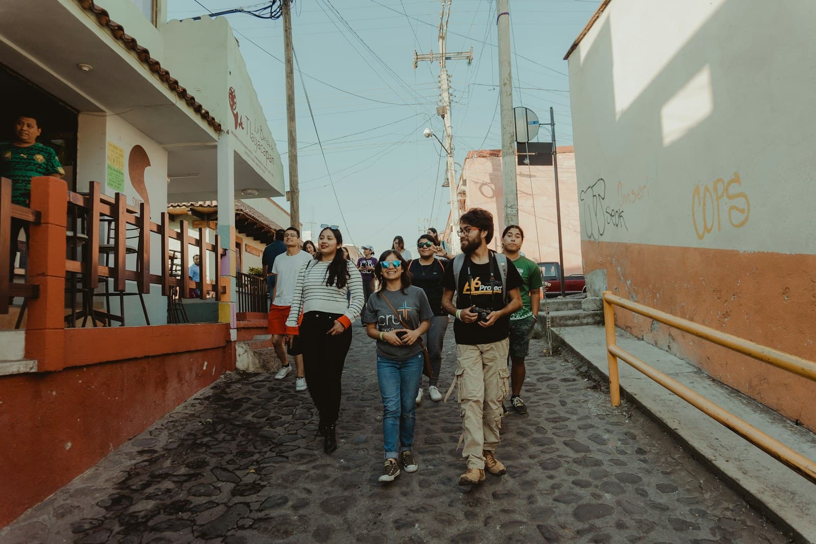 Tlayacapan — a group of people walking down a street